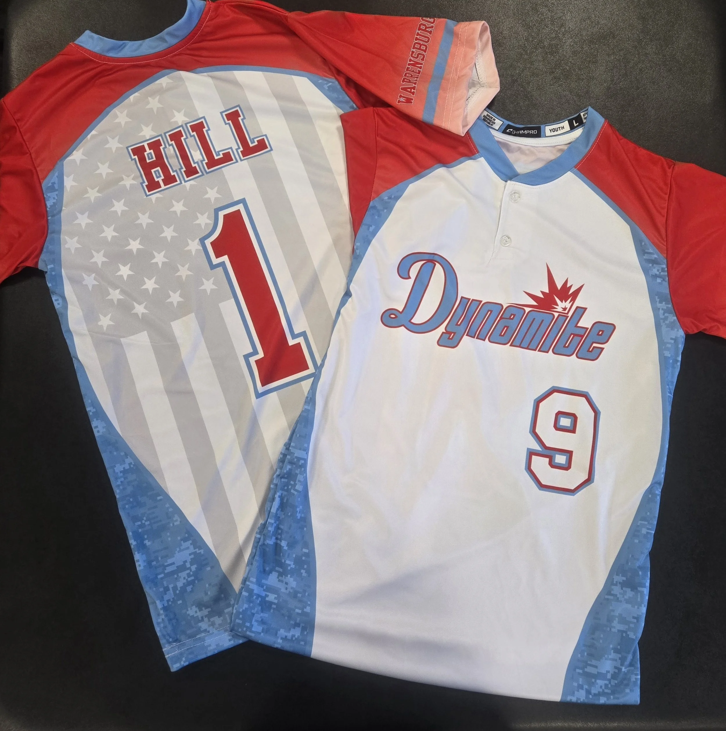 Team jerseys, Dynamite jerseys, baseball jerseys, custom jerseys, patriotic jerseys, team jerseys, team uniforms, red white and blue jerseys with transparent flag in background