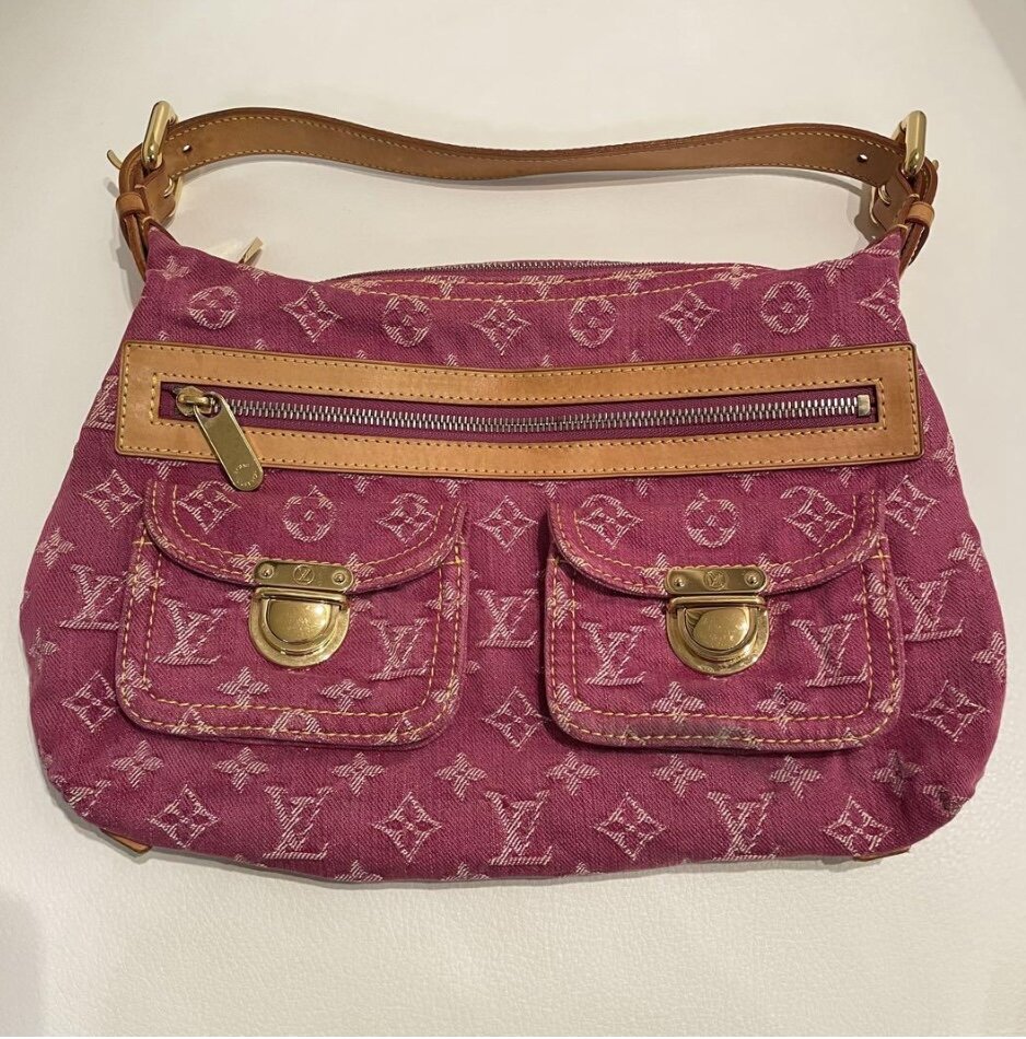 Louis Vuitton “Capucines PM” bag in Pink Framboise worn by