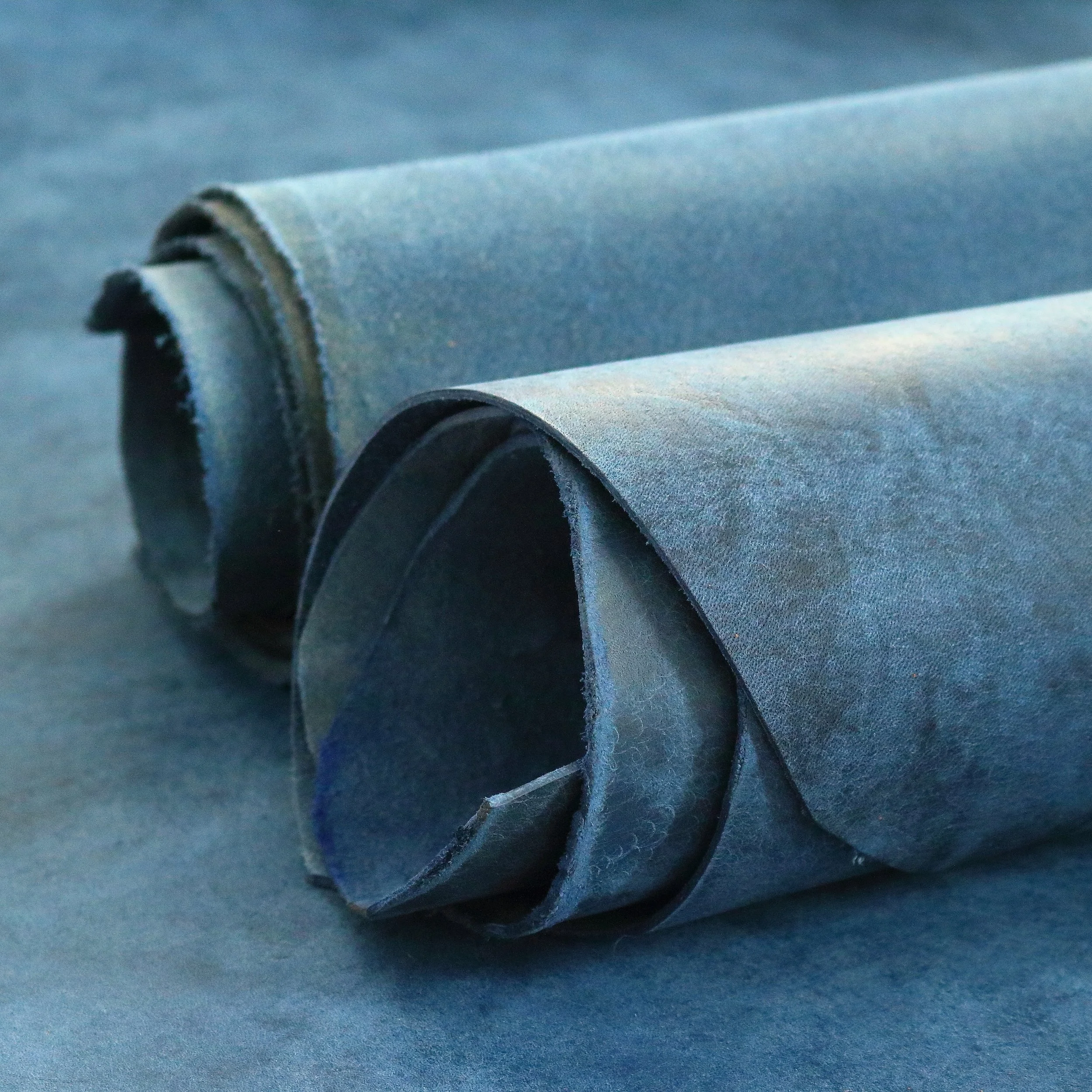 Blue vegetable tanned Italian leather for crafts. EU based supplier.