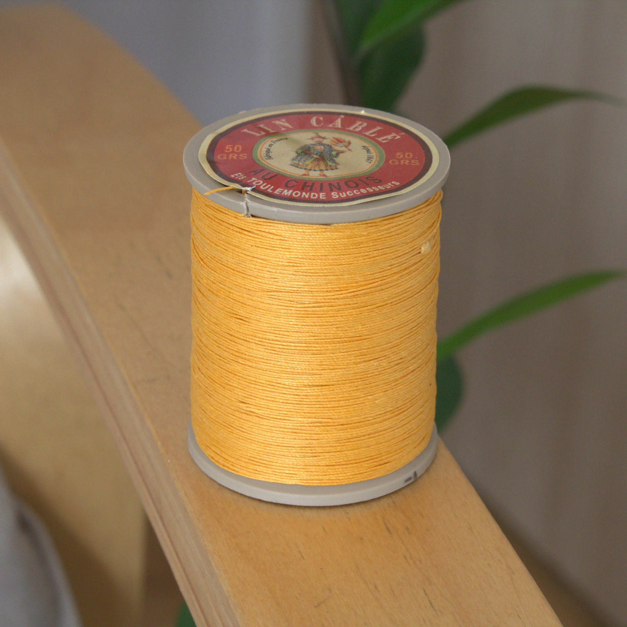 Sajou Fil Au Chinois Cable linen waxed thread 632 spool 508 - Yellow. Strong French linen thread. Great for leatherworking, book biding, jewelry making.
