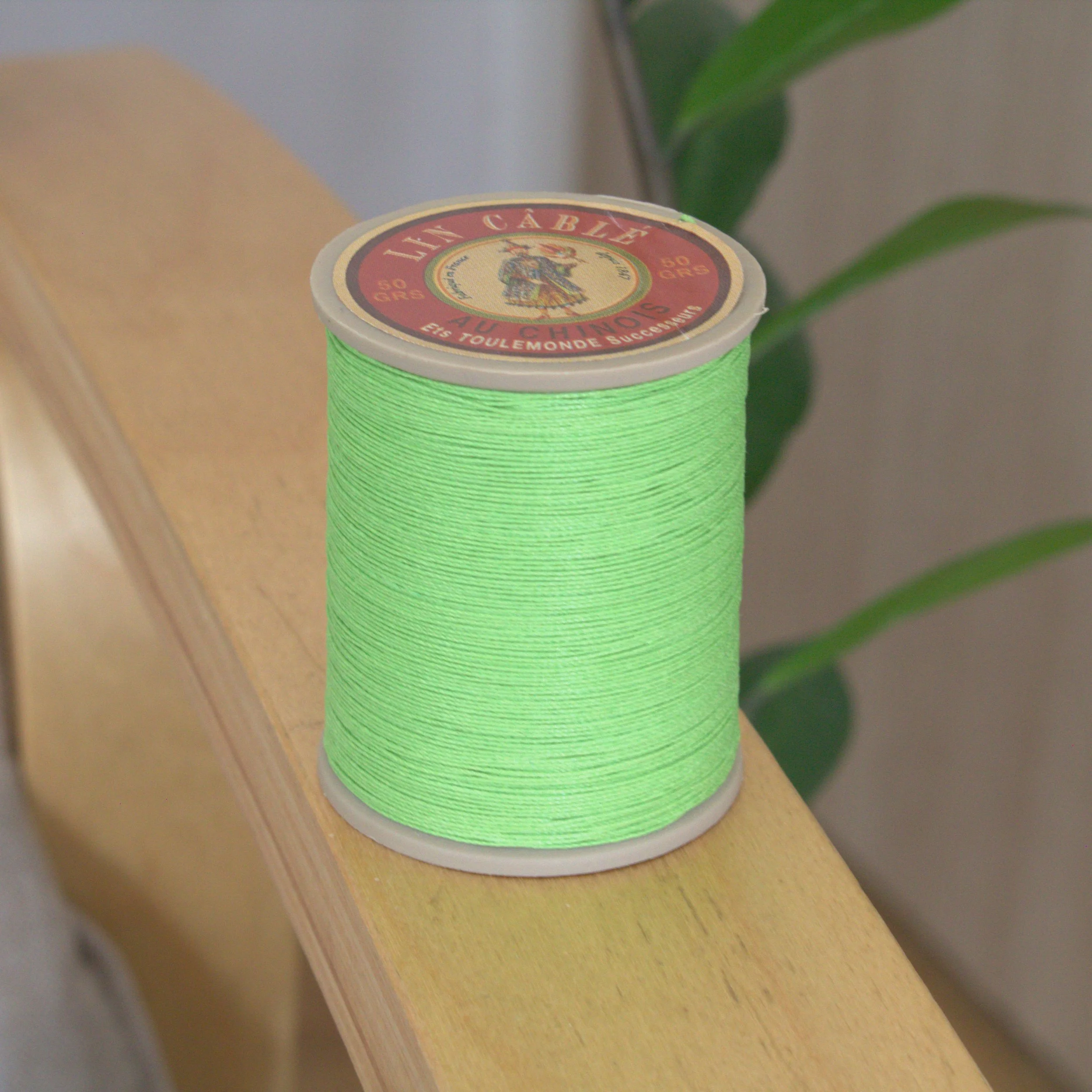 Sajou Cable linen thread 632 spool 455 - Light green.  Green color French linen thread at 0.5 thickness. Great for leathercrafting, book biding, jewelry making.