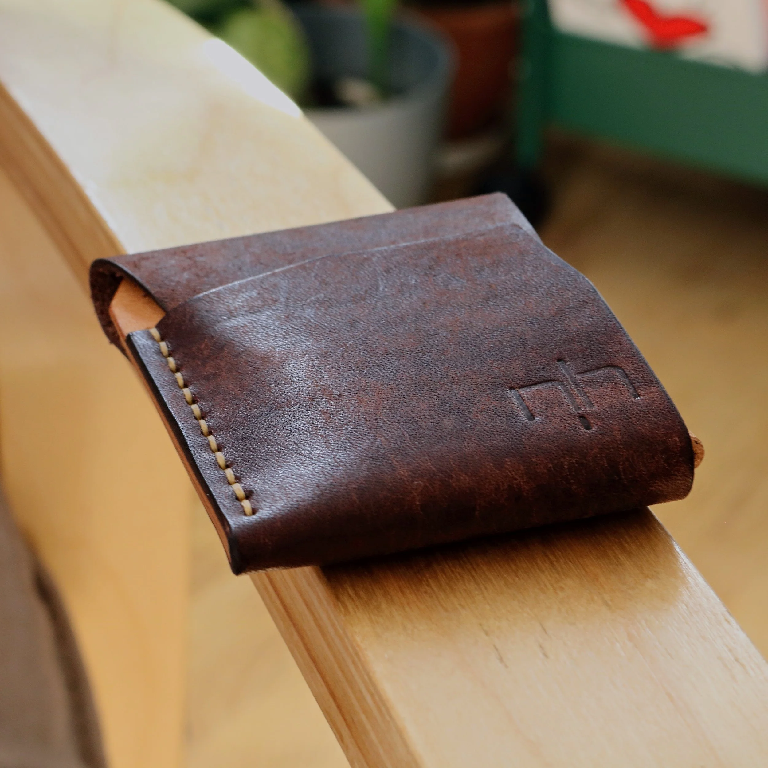 thin handmade flap leather wallet for cards and bank notes. Handmade in Europe