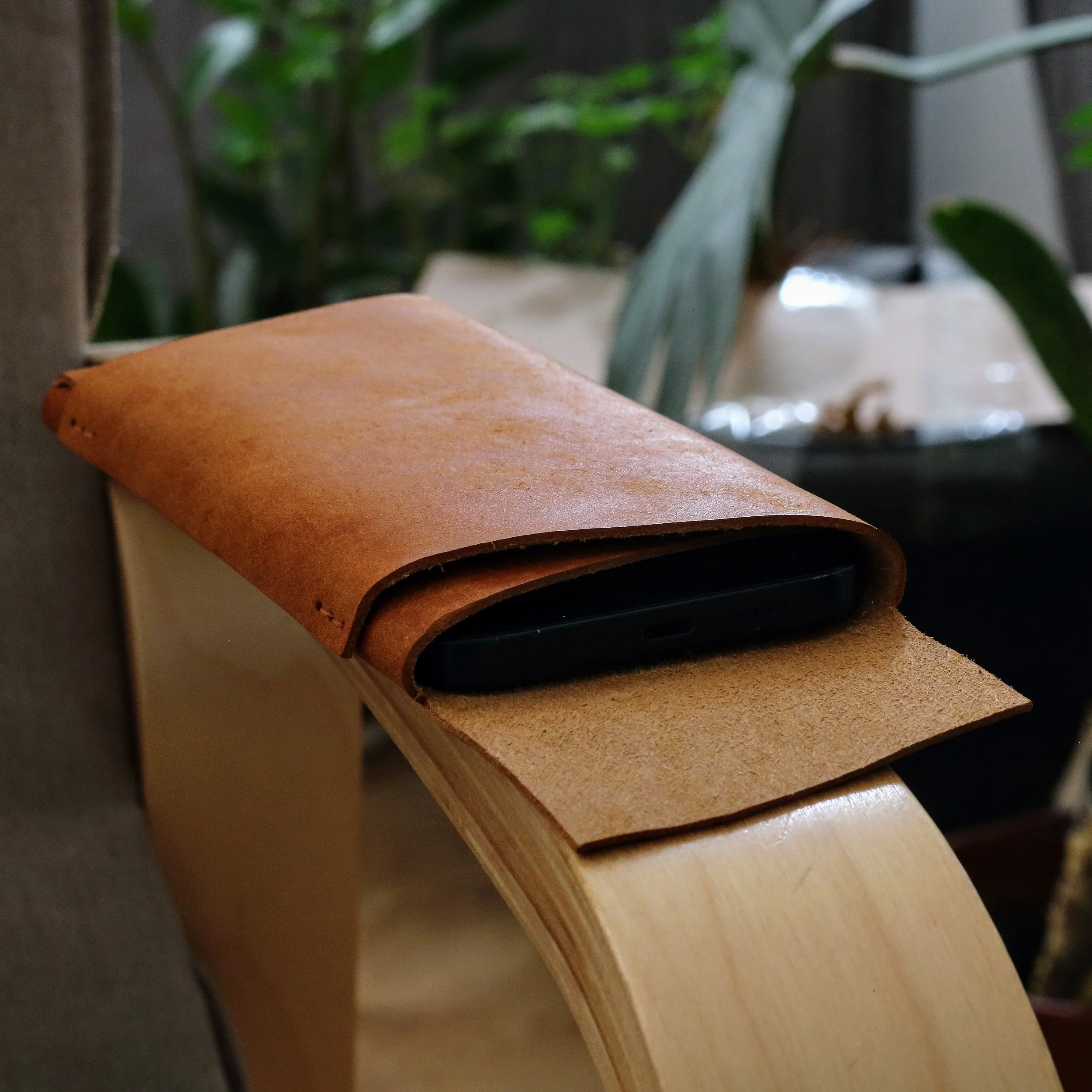 brown veg tan leather minimalist phone sleeve with card pocket. made by hand in EU