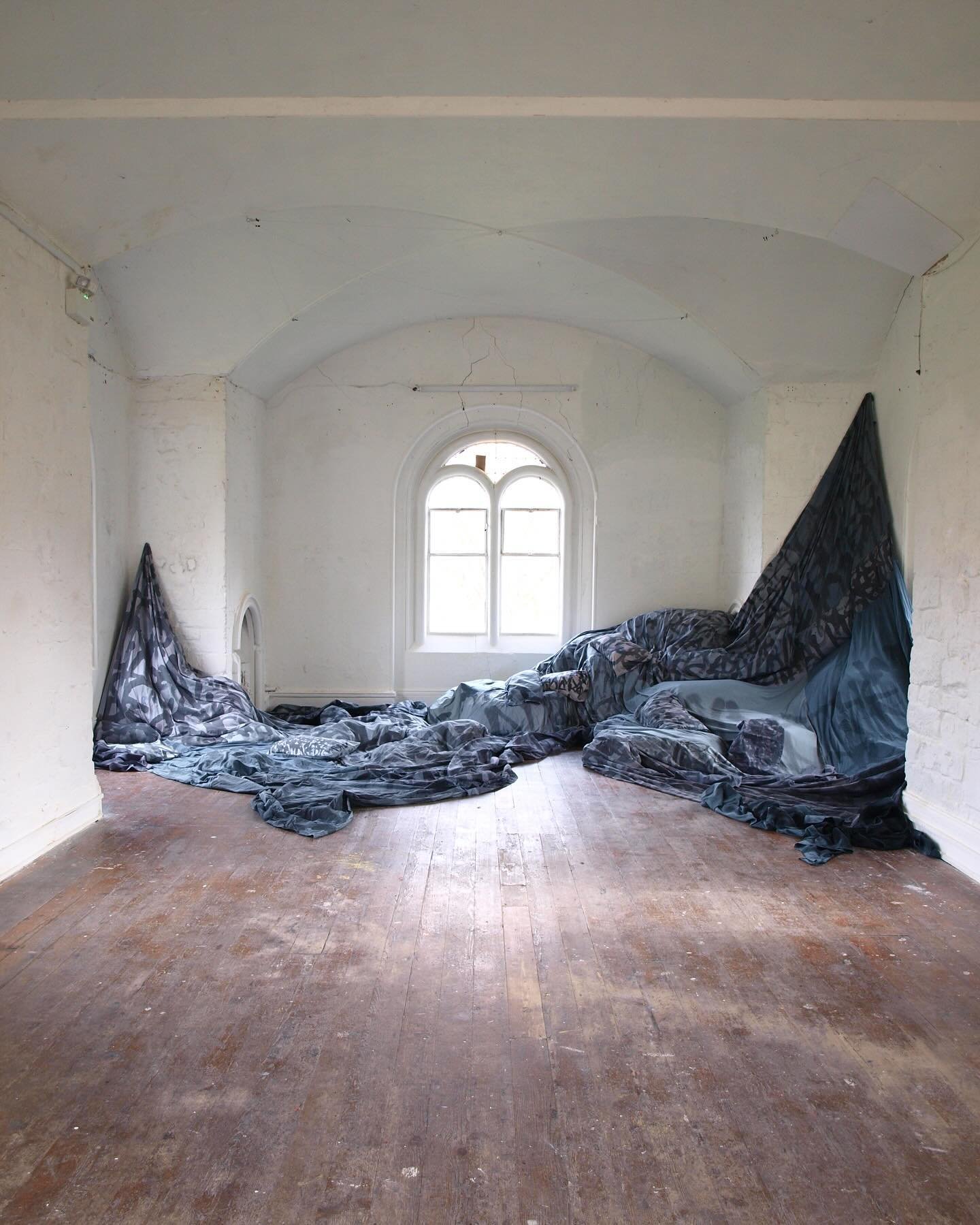 Aegri Somnia, installation at Walcot Chapel, 2024. [old bed linens, bedding and ink] Kate McDonnell.

#contemporaryart #contemporarysculpture #art #artist #installationart #artinstallation #fabricart #sculpture #insomnia