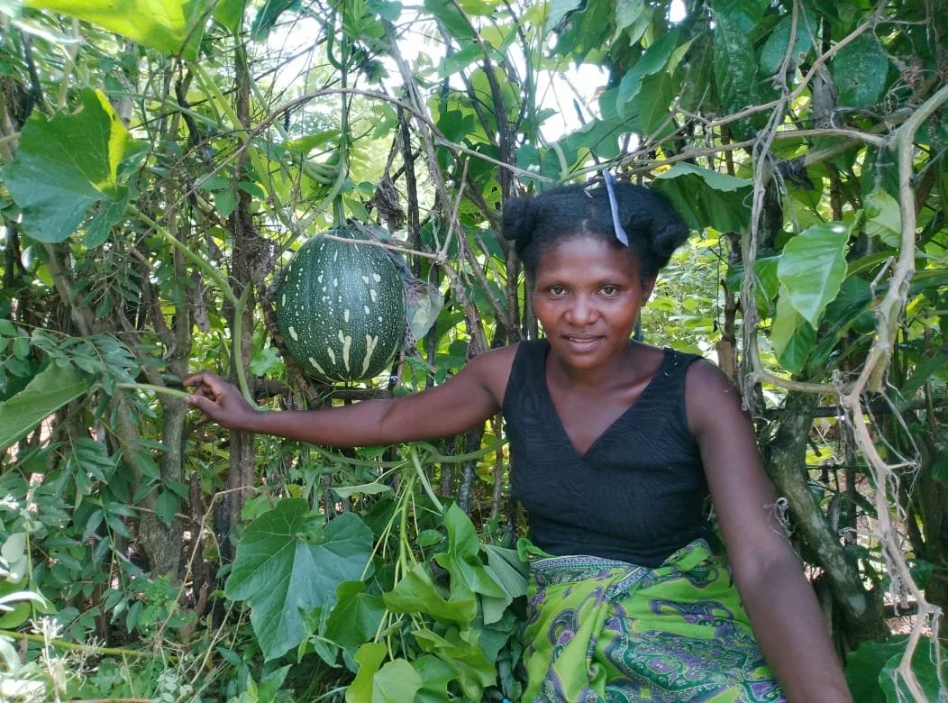 Marceline on her farm plot