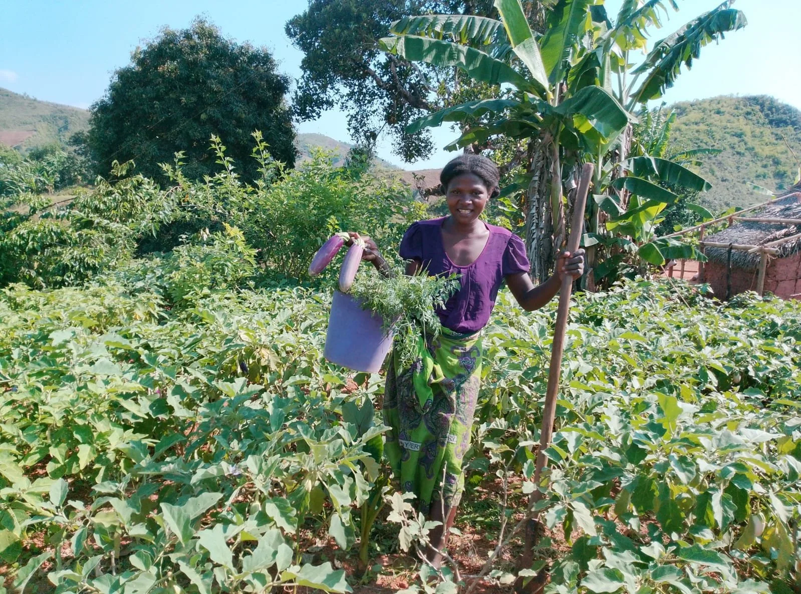 Marceline on her farm plot