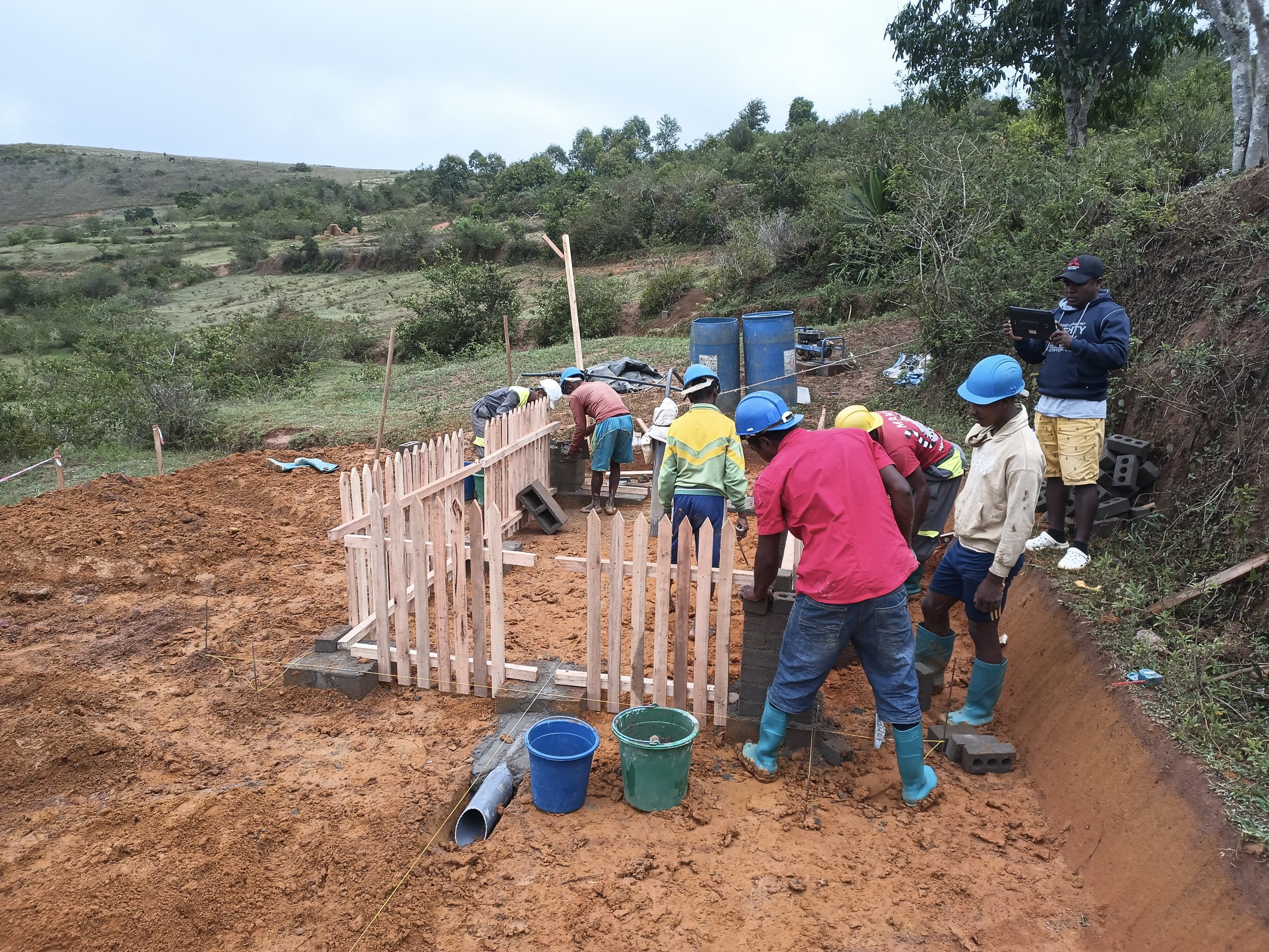 Putting the wooden fence up 