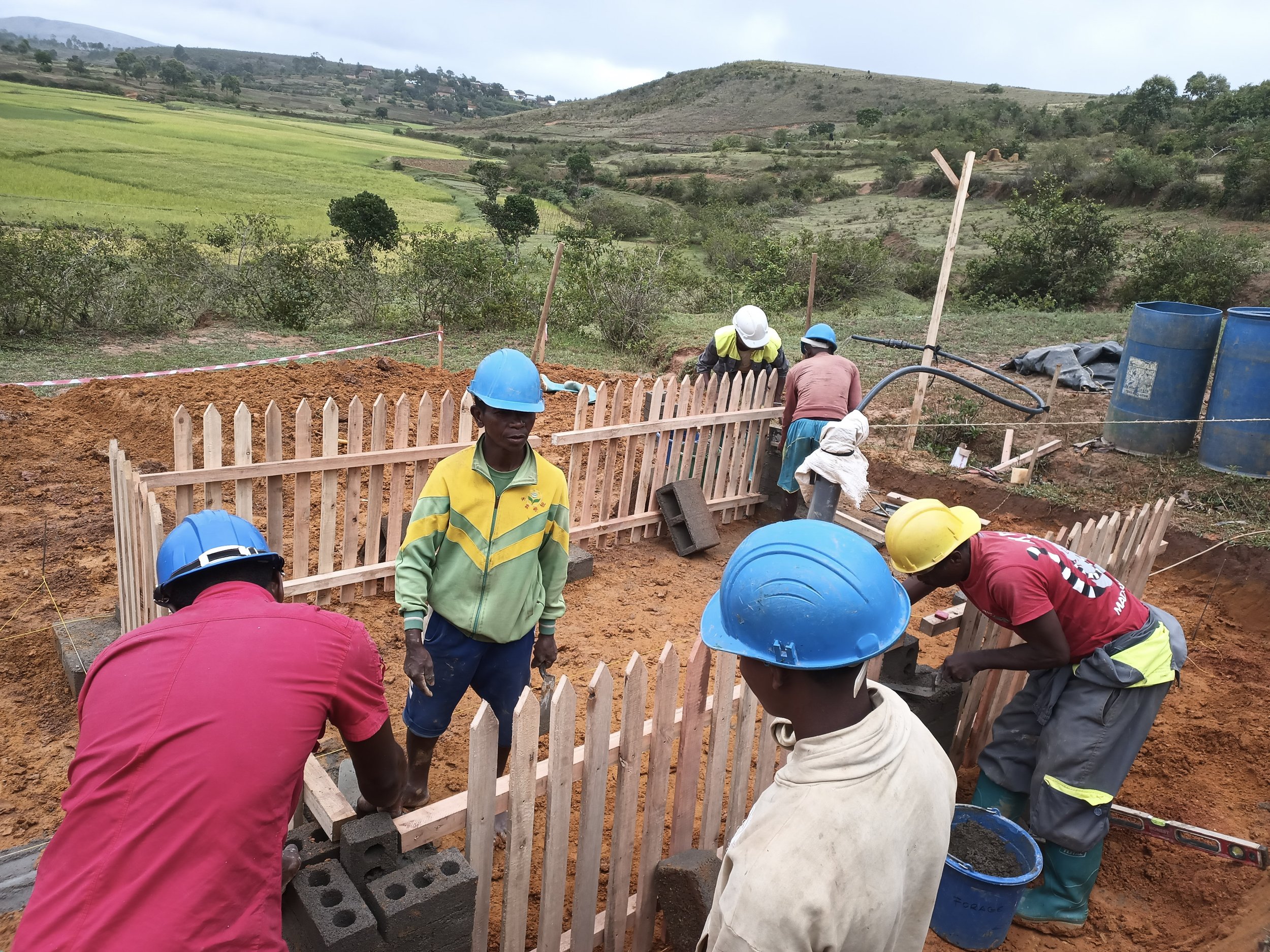 Putting the wooden fence up 