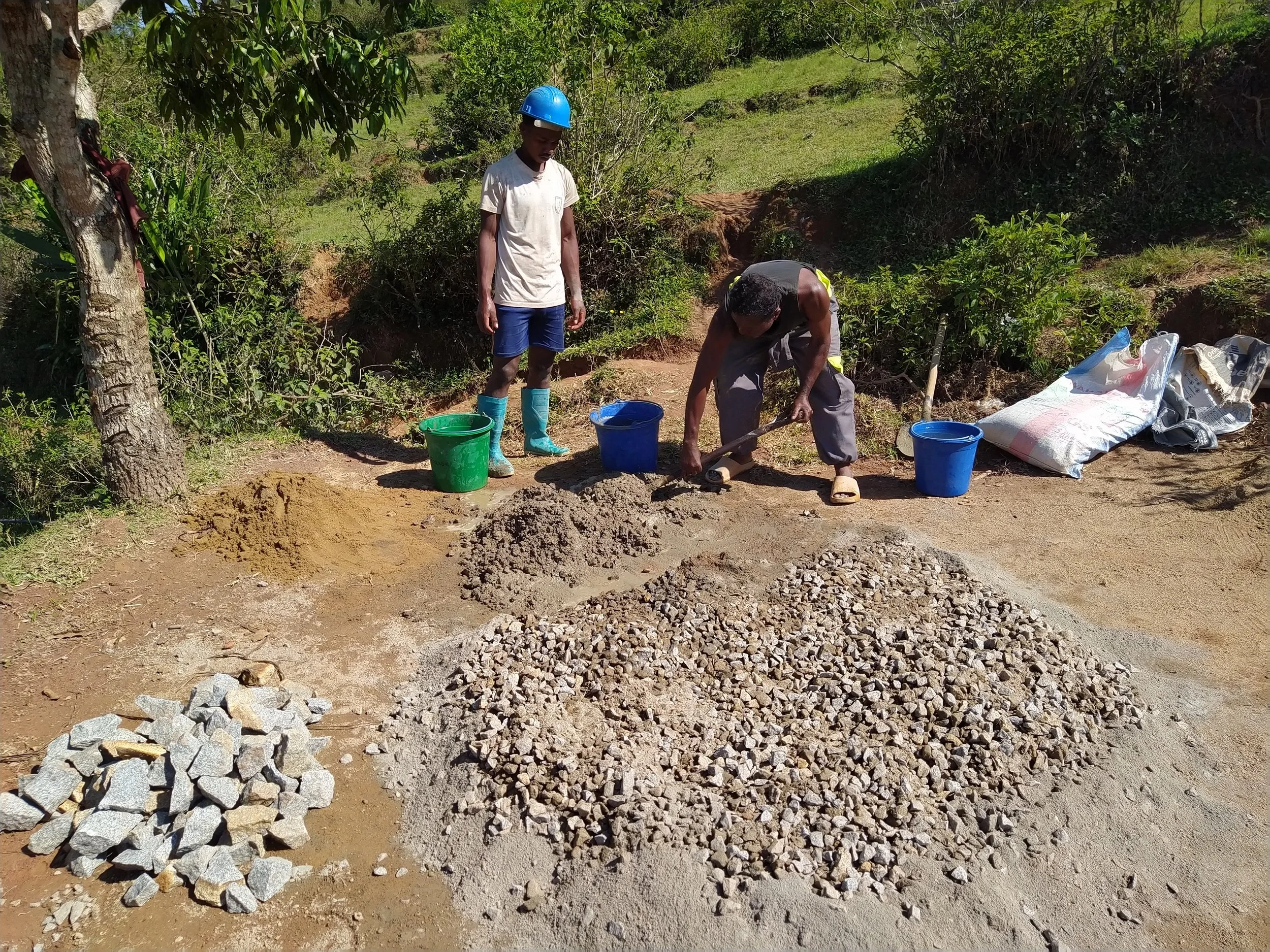 Gravel contributed by the community prior to construction