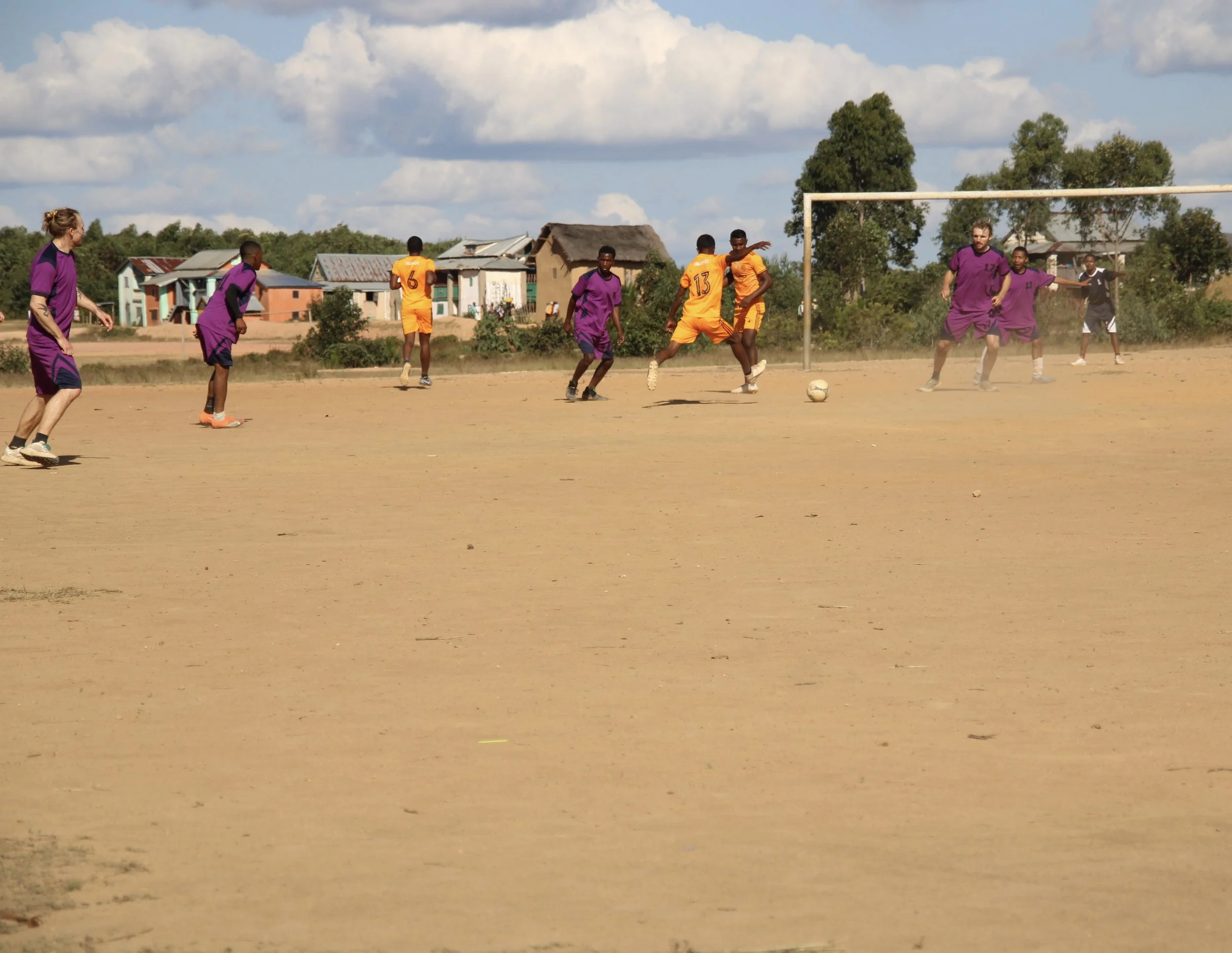 Friendly football match with the local youth team