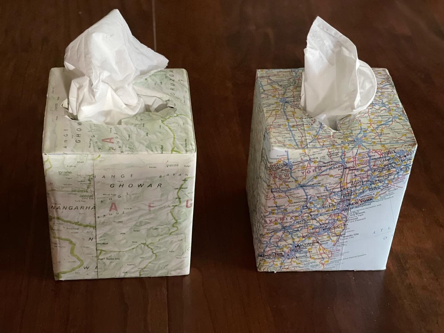 Remembering:  Two tissue boxes wrapped in maps of NYC and Afghanistan&mdash;this art was created twenty years ago by @christinepaulart as a response to September 11th by artists at @graceportland  #september11 #gracememorialepiscopalchurch  #cityands