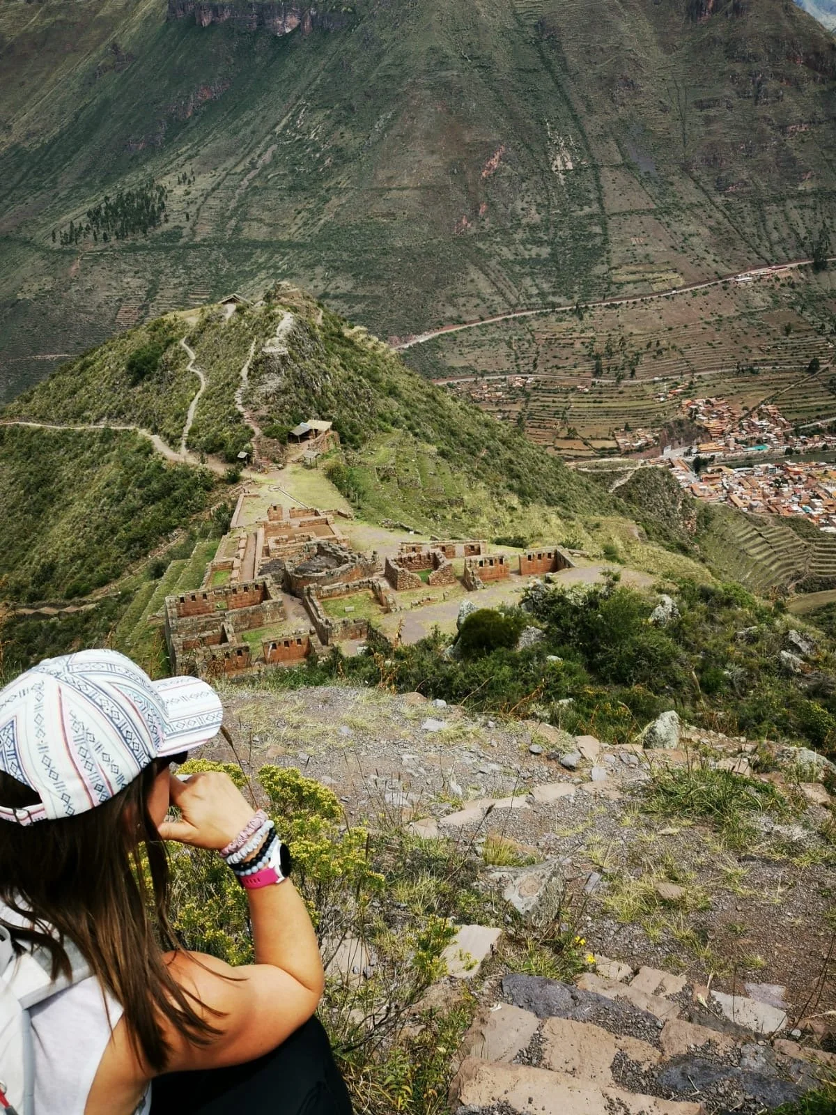 Tonia Johnson overlooking ancient ruins and the mountain landscape of Peru’s Sacred Valley.