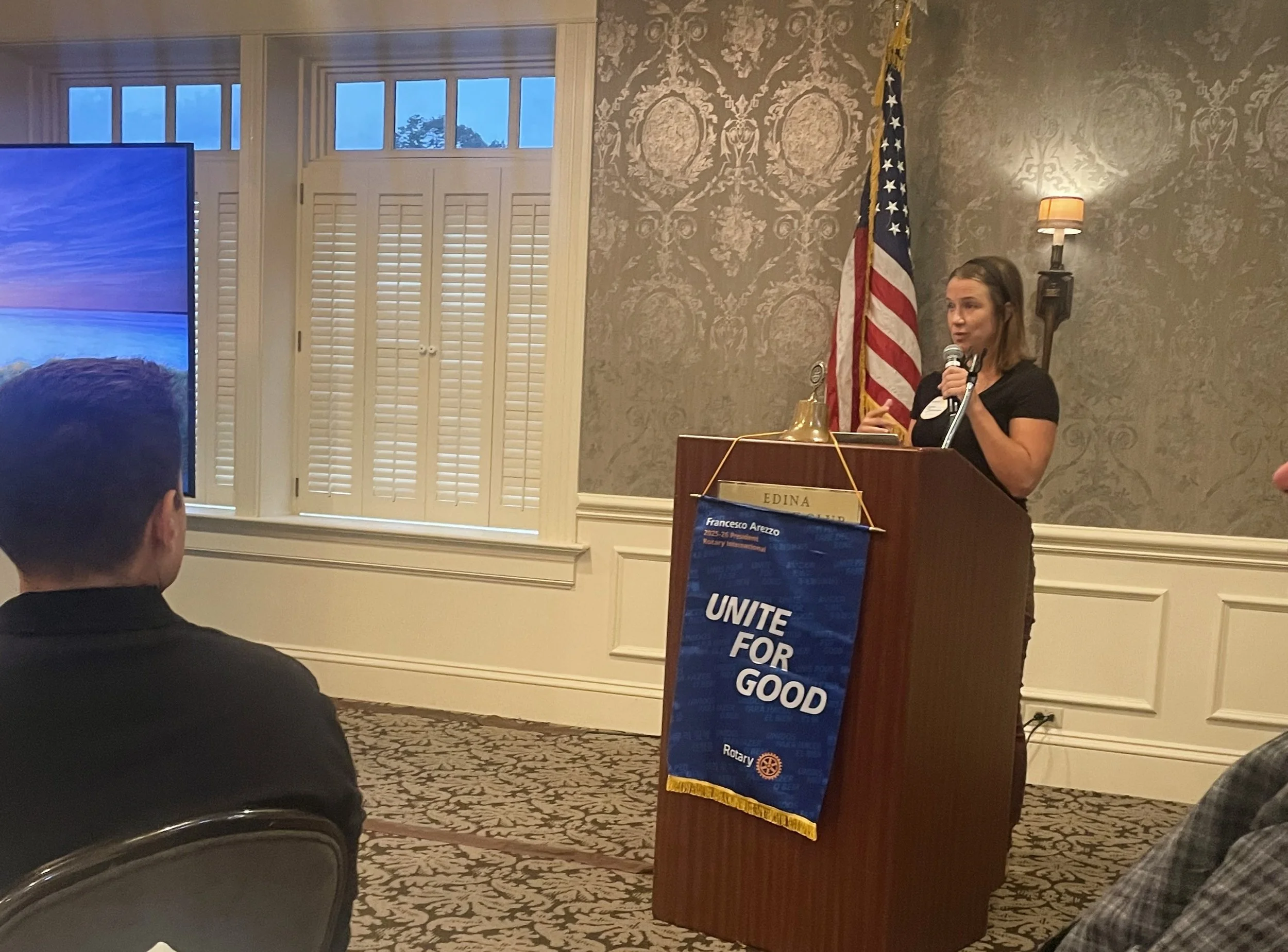 Tonia Johnson speaking at a community gathering.