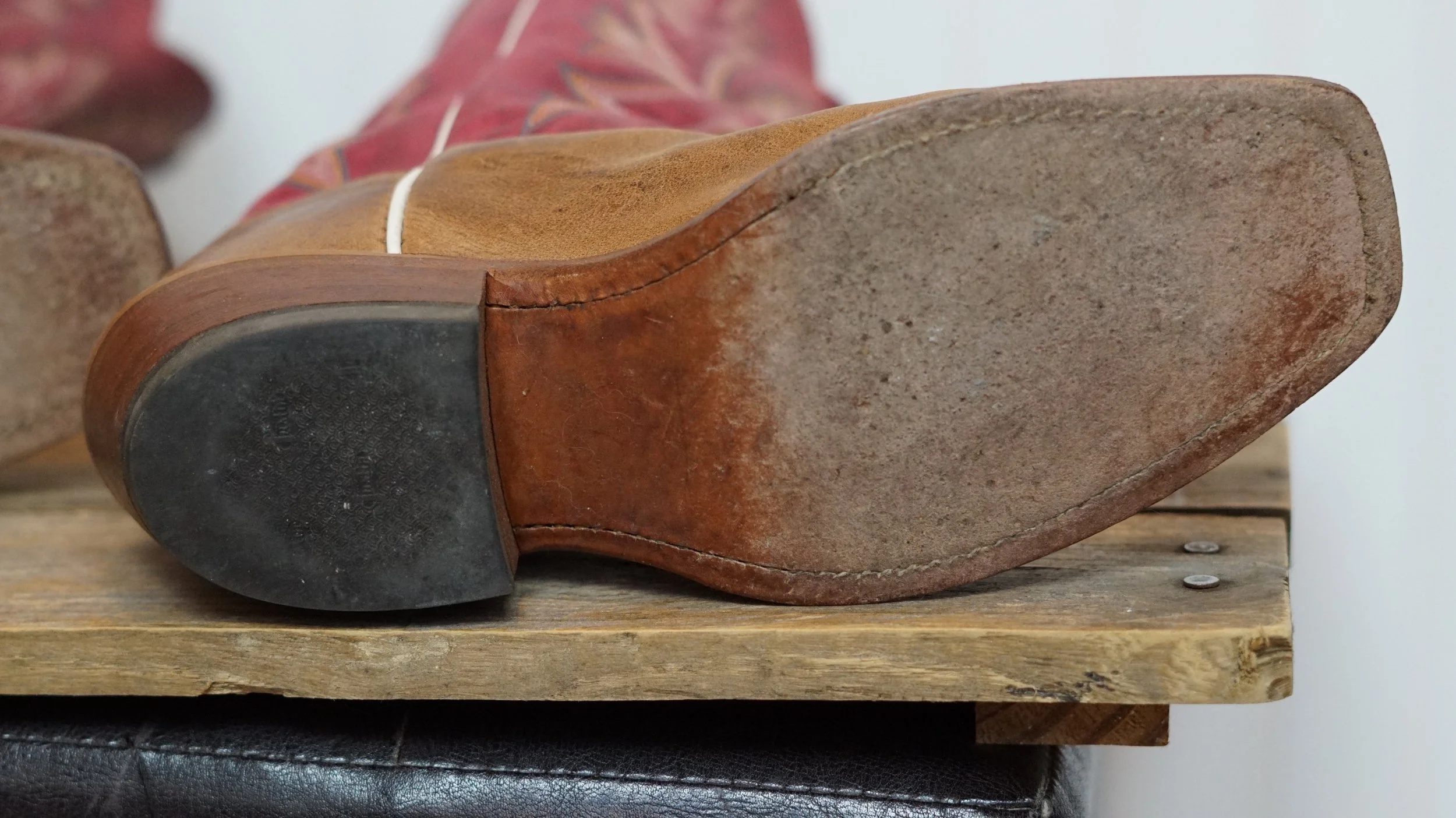 Justin BRL315 Ladies Bent Rail Western Boot with America Burnished Tan Cowhide Foot and a Single Stitched Wide Square Toe Bottom of Right Boot