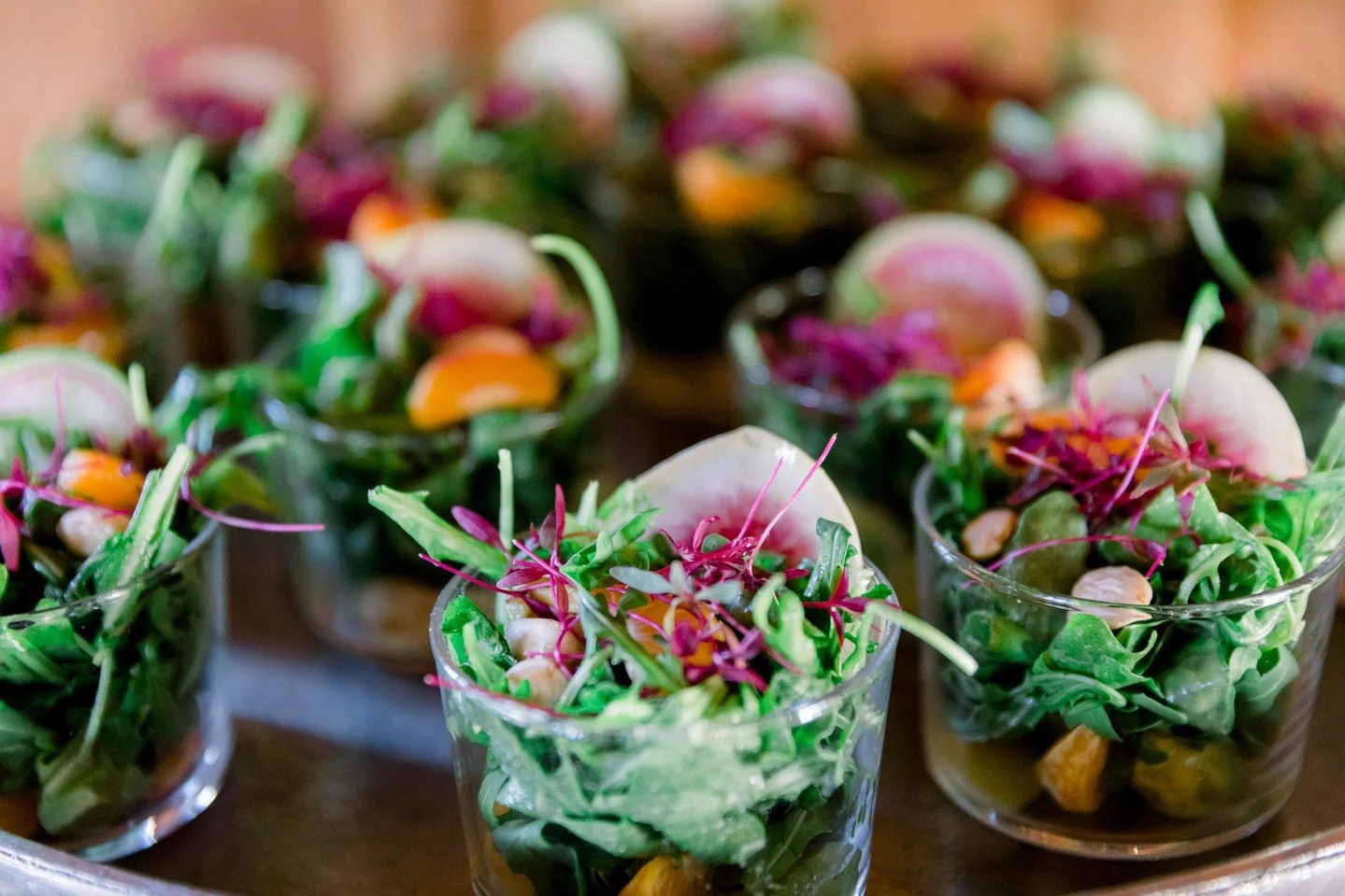 Bright, fresh, and full of flavor 🍊🥑 Our Tangerine &amp; Avocado Vasi Salad layers organic arugula, creamy avocado, Marcona almonds, citrus vinaigrette, and micro beet greens!⁠
⁠
Photography: @katiewallphotography⁠
Catering: @coastcatering⁠
Rentals