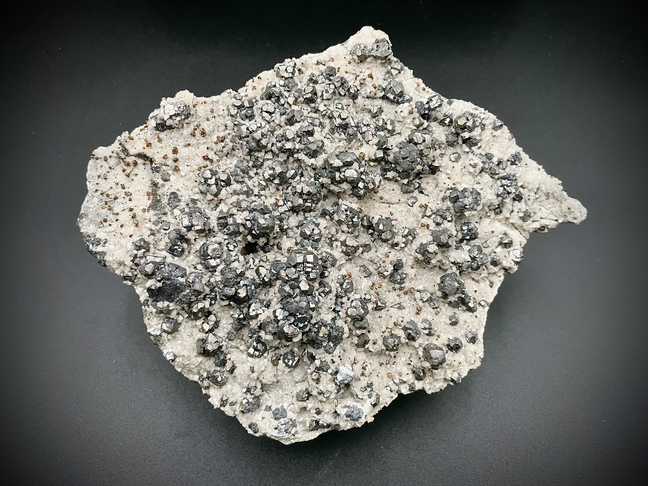 Cubic galena and calcite crystal cluster from Missouri on black background