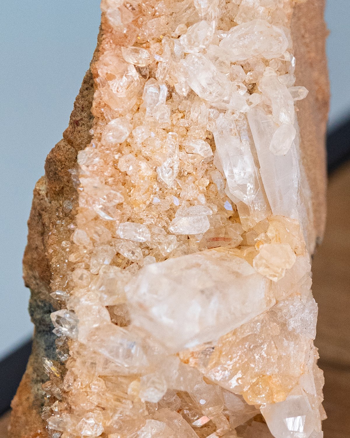 Detailed view showing prismatic edges and layered selenite crystals against tan matrix