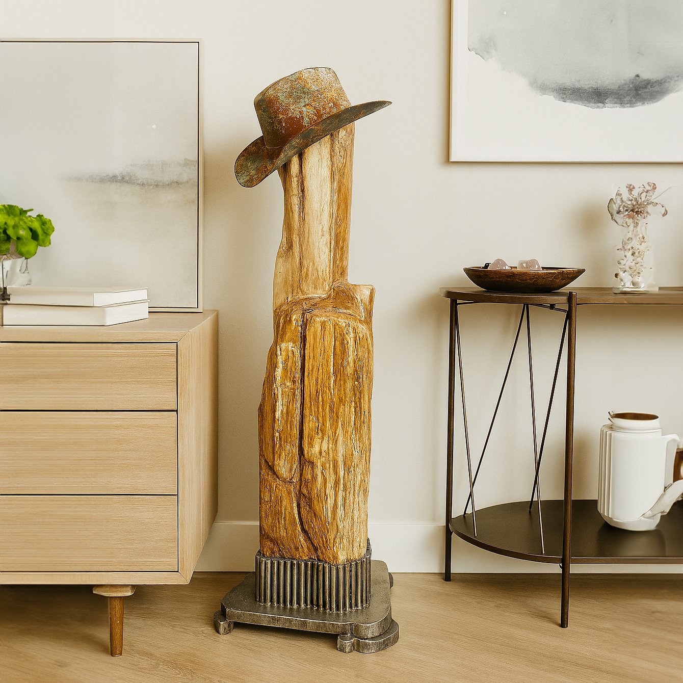 Tall petrified wood sculpture on custom steel base with rustic hat in Dallas interior