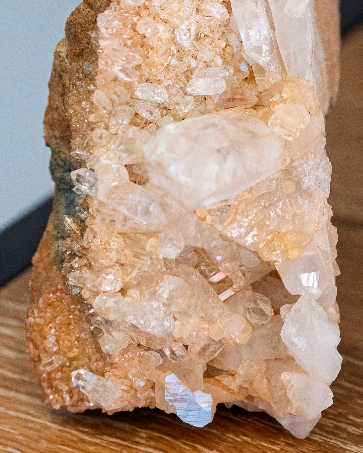 Close-up of bottom crystal formations on phantom selenite with reflective facets