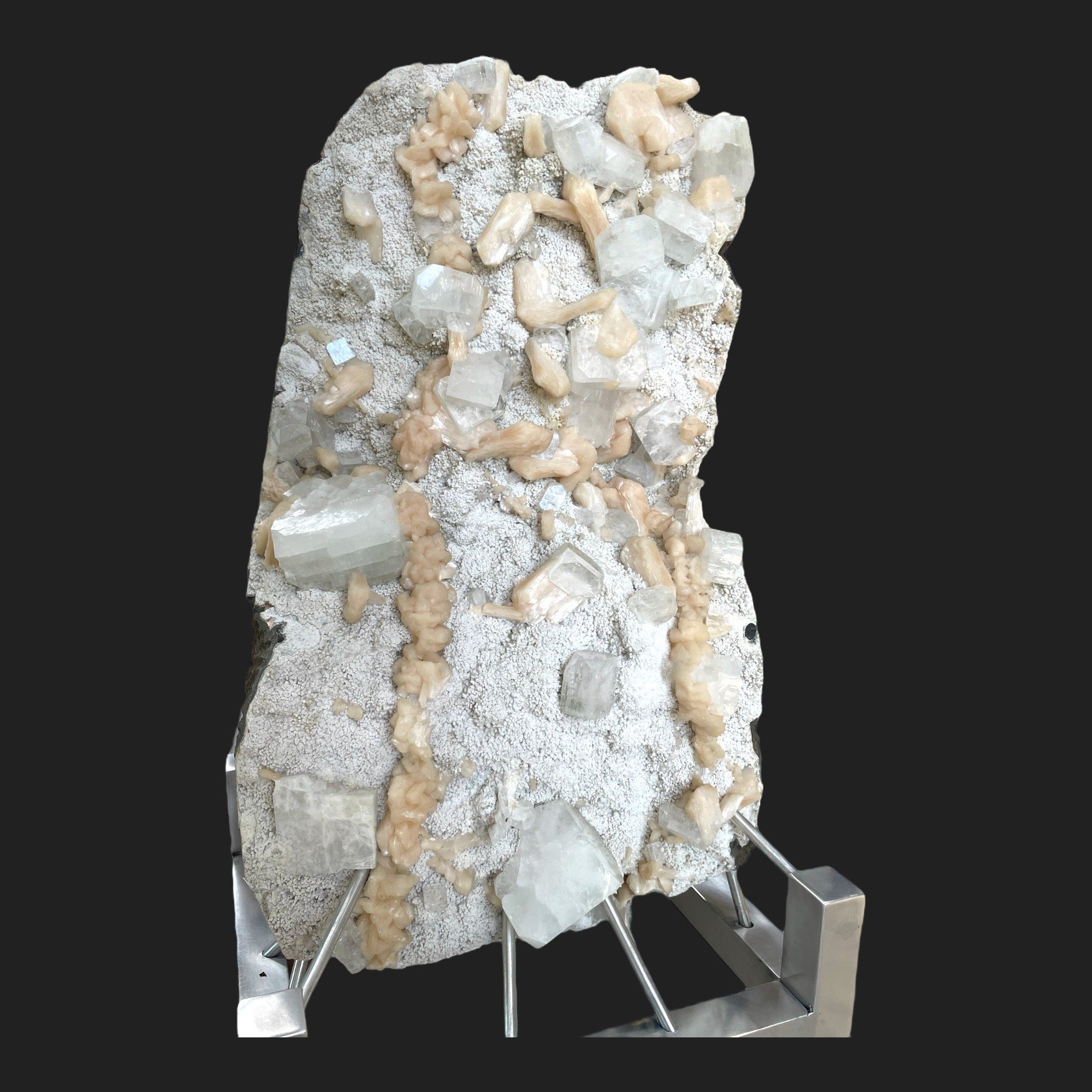 Apophyllite crystal cluster with peach stilbite on a white druzy matrix, mounted on a silver metal base