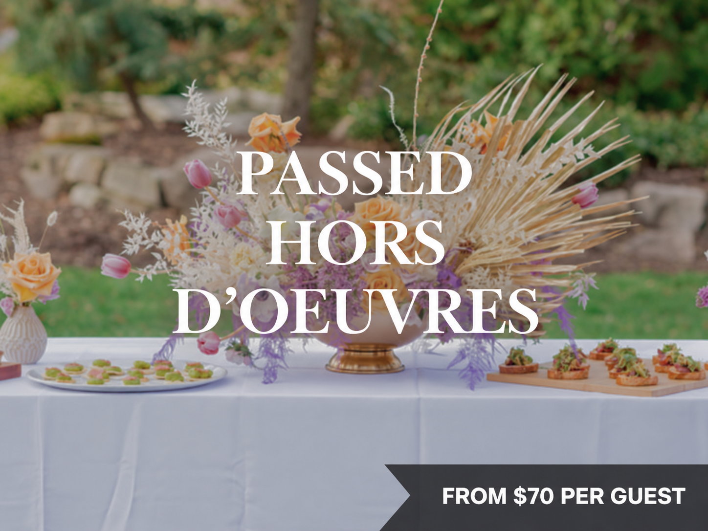 Passed Hors d’Oeuvres — from $70 per guest, with chef-crafted bites and flowers on an outdoor reception table.