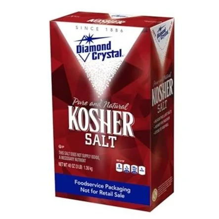 Red and white box of Diamond Crystal Kosher Salt showing label and packaging details.