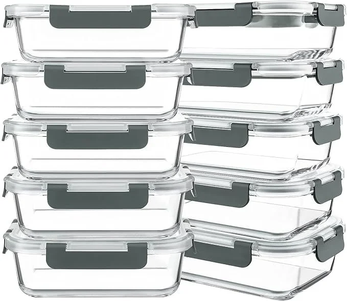 Stacked glass food storage containers with black and gray clips