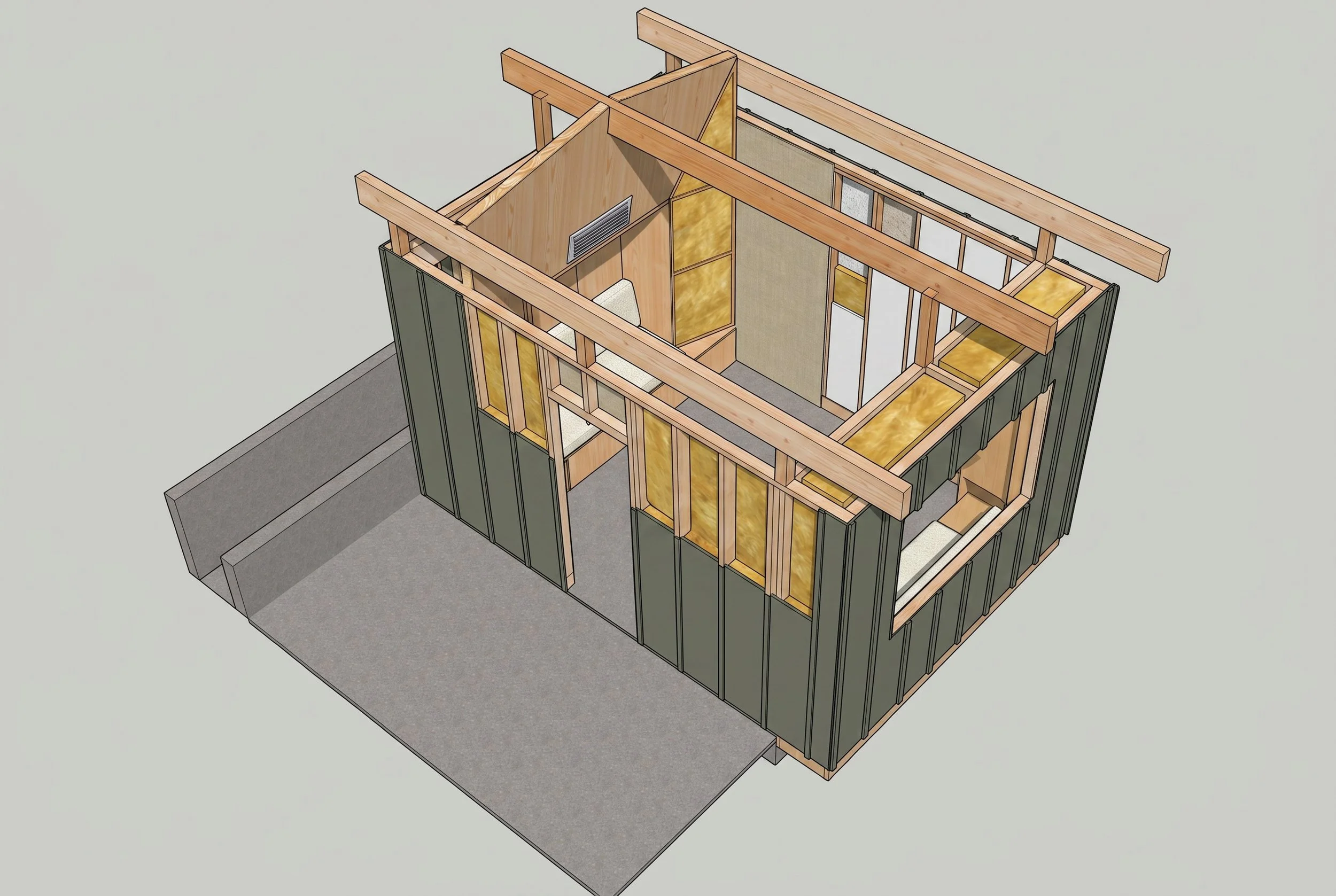 Construction of the rear wall assembly reveals the studio's integrated acoustic strategy. While the rigid fiberglass insulation shown here is used primarily for sound control, the building's thermal envelope is provided by a continuous layer of exter