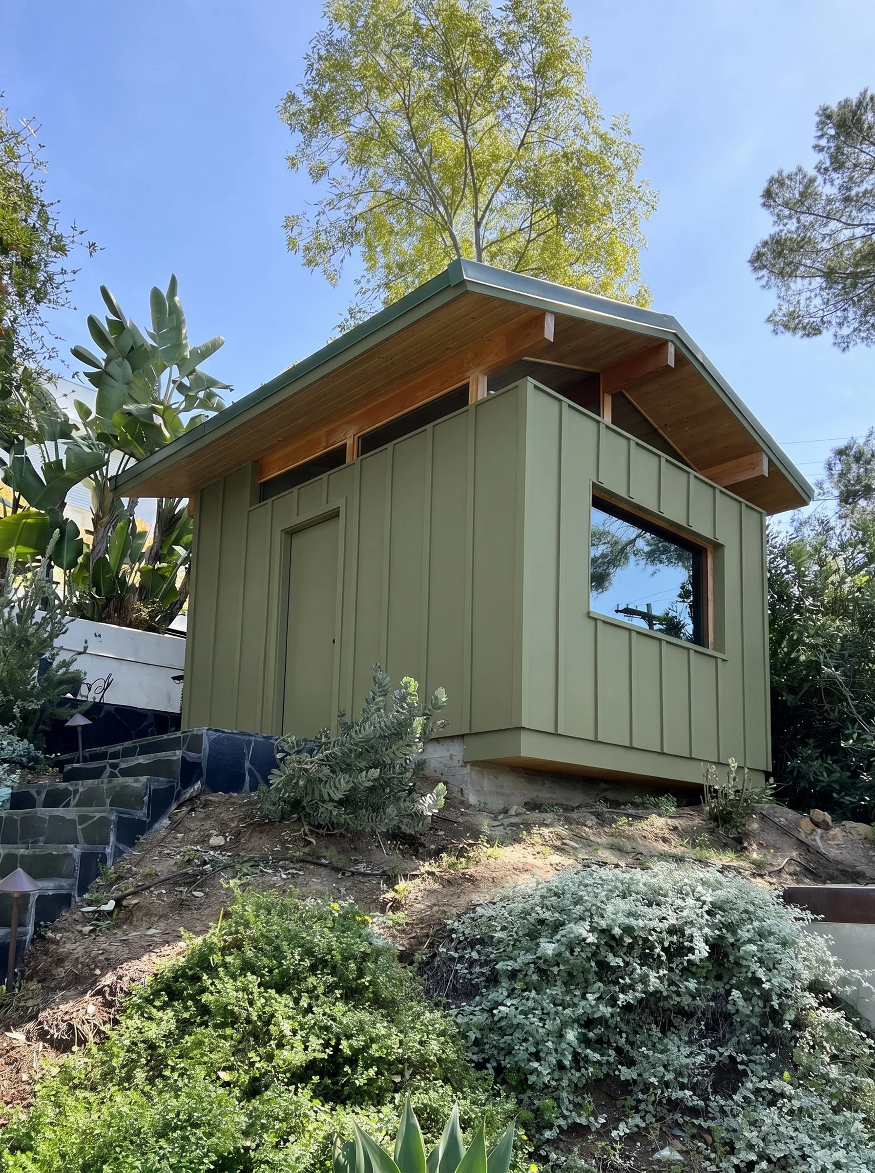 Nestled into the canopy above Silver Lake, the 120-square-foot studio reads almost like a treehouse, providing a quiet writing space overlooking the city beyond.