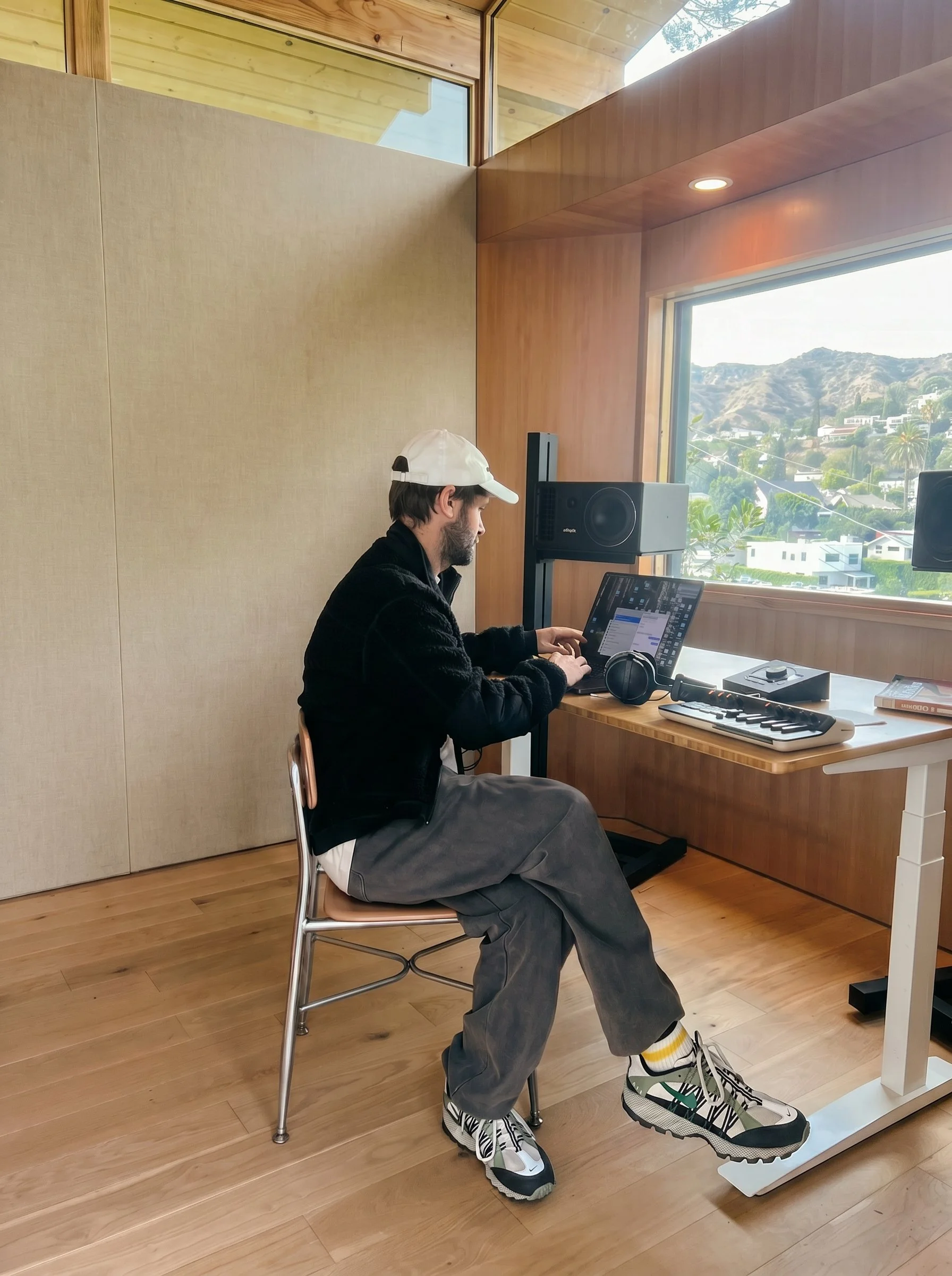 Designed as a quiet retreat overlooking Silver Lake, the studio provides a dedicated environment for composing, recording, and focused creative work.