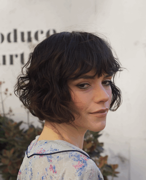 Soft, textured French bob haircut with natural movement and face-framing bangs, created by hairstylist Sal Salcedo.