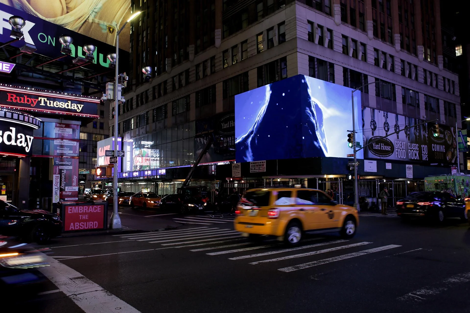 Nighttime Renderfruit digital artworks exhibited three times in Times Square, New York — large-scale LED screens and 3D motion design installations.