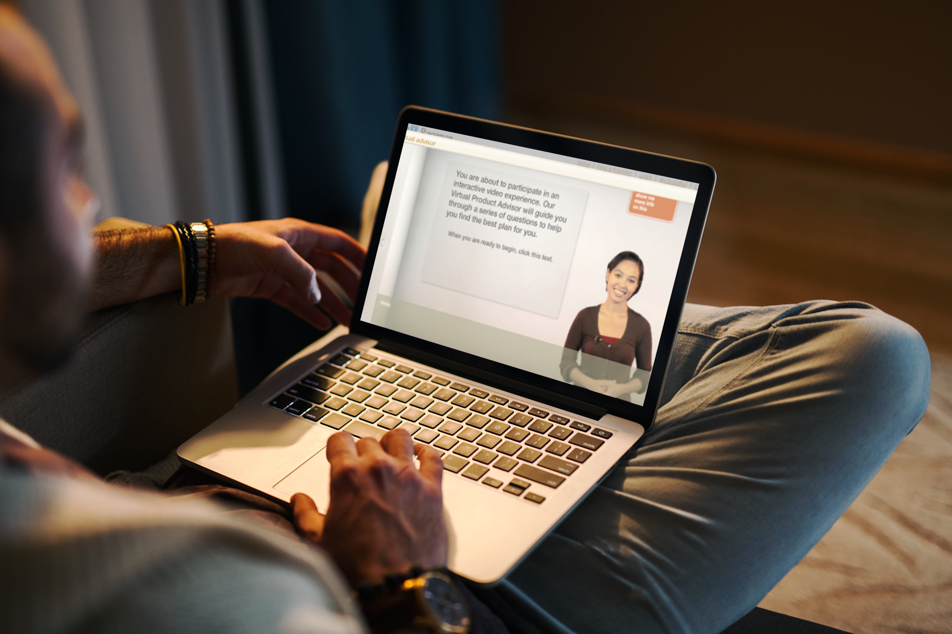 mockup-of-a-man-using-a-macbook-in-a-cozy-living-room-2324-el1.png