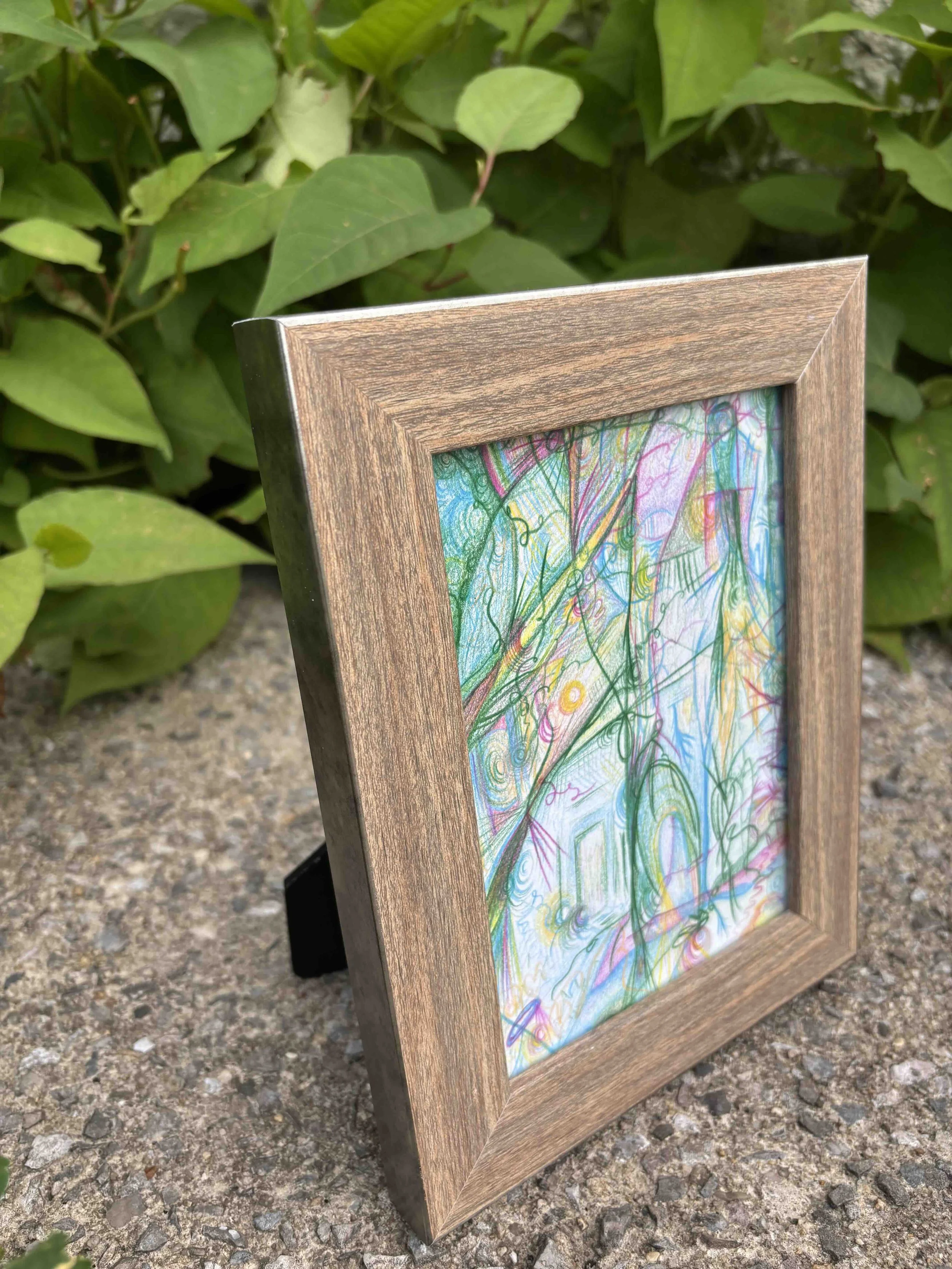 drawing-in-tabletop-frame-shown-outdoors.jpg