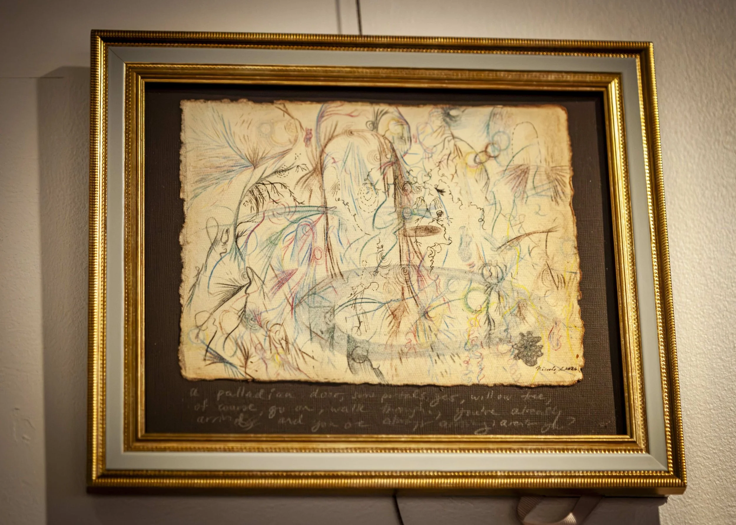 framed-mixed-media-artwork-on-gallery-wall.jpeg
