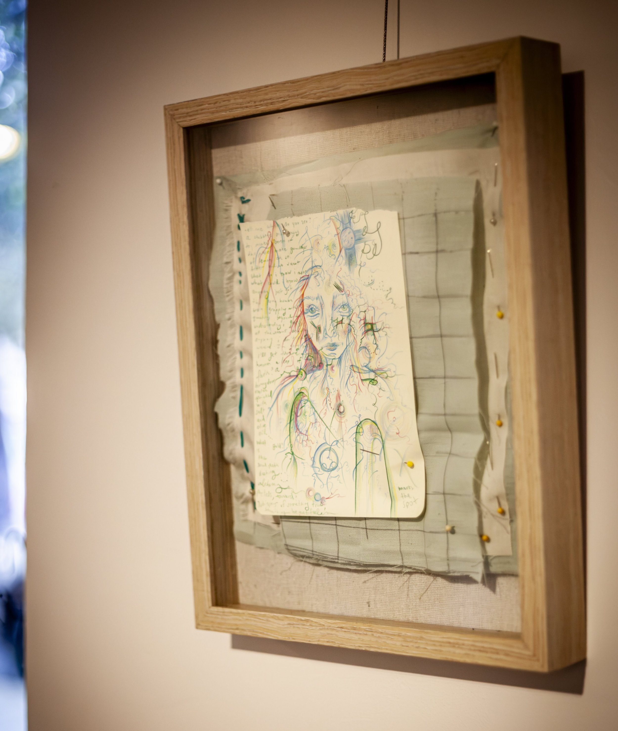 artwork-with-face-and-embroidery.jpeg