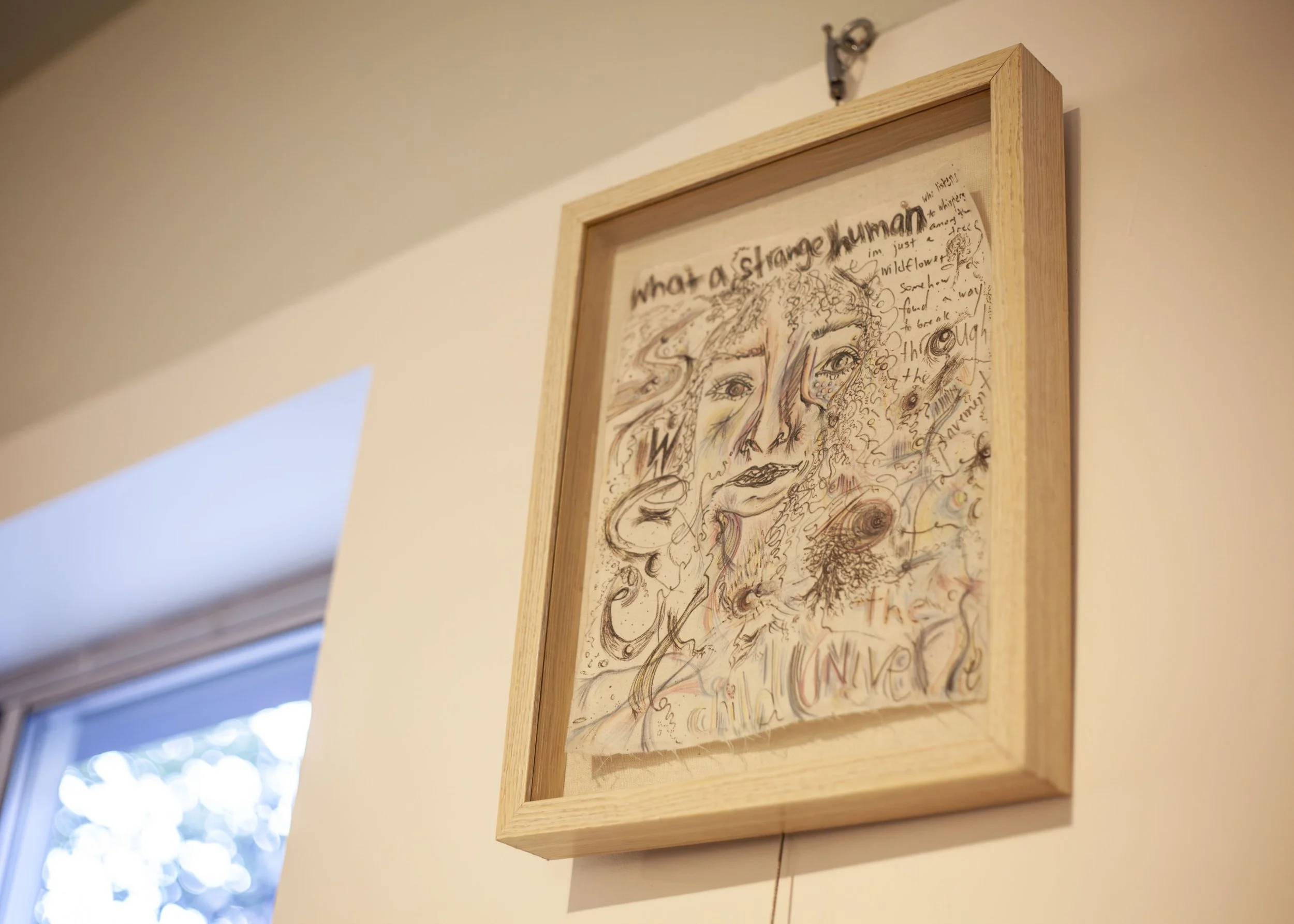potrait-drawing-on-fabric-in-shadow-box-frame.jpeg