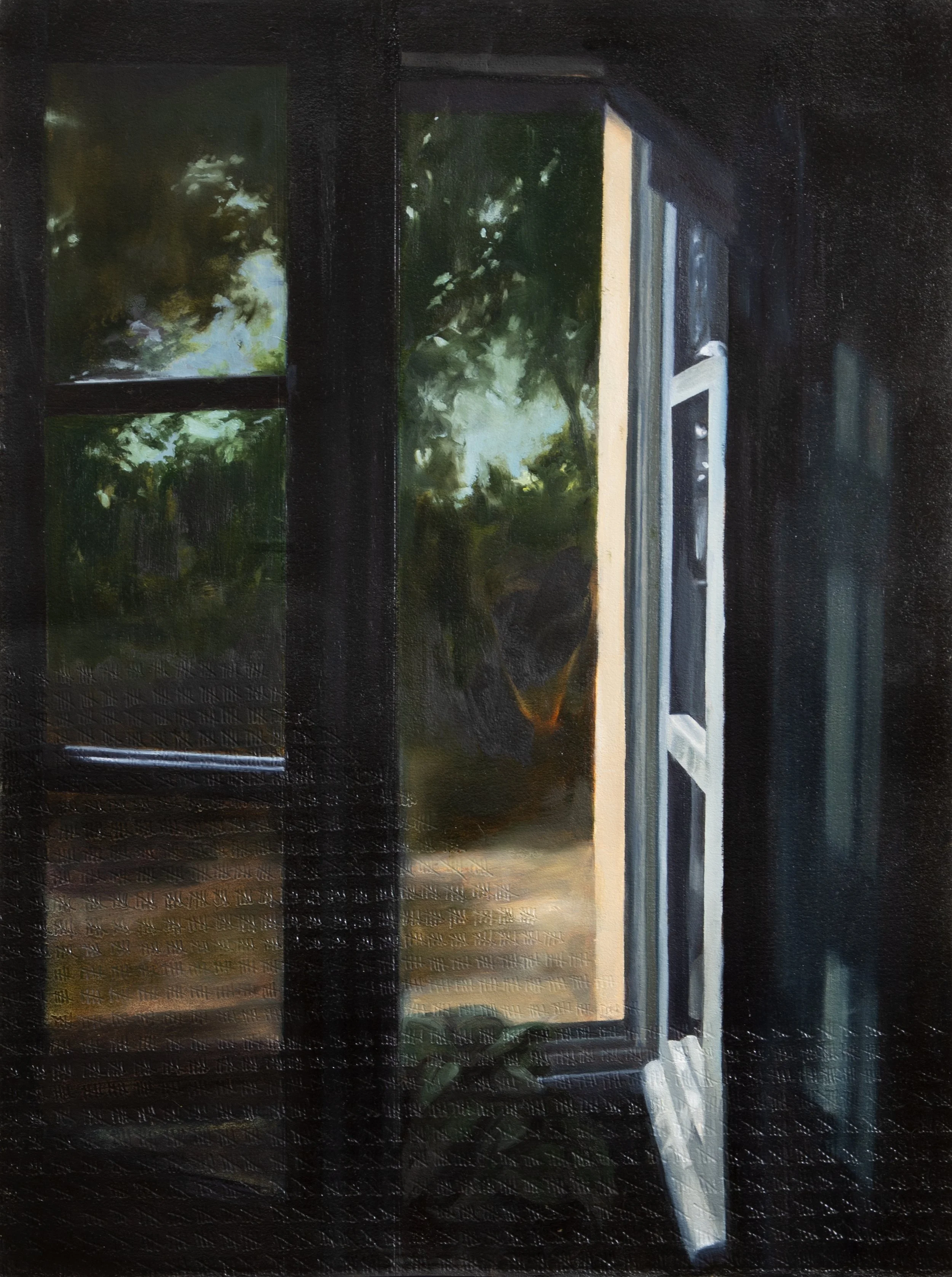 A window at nightime looking out on an evening garden