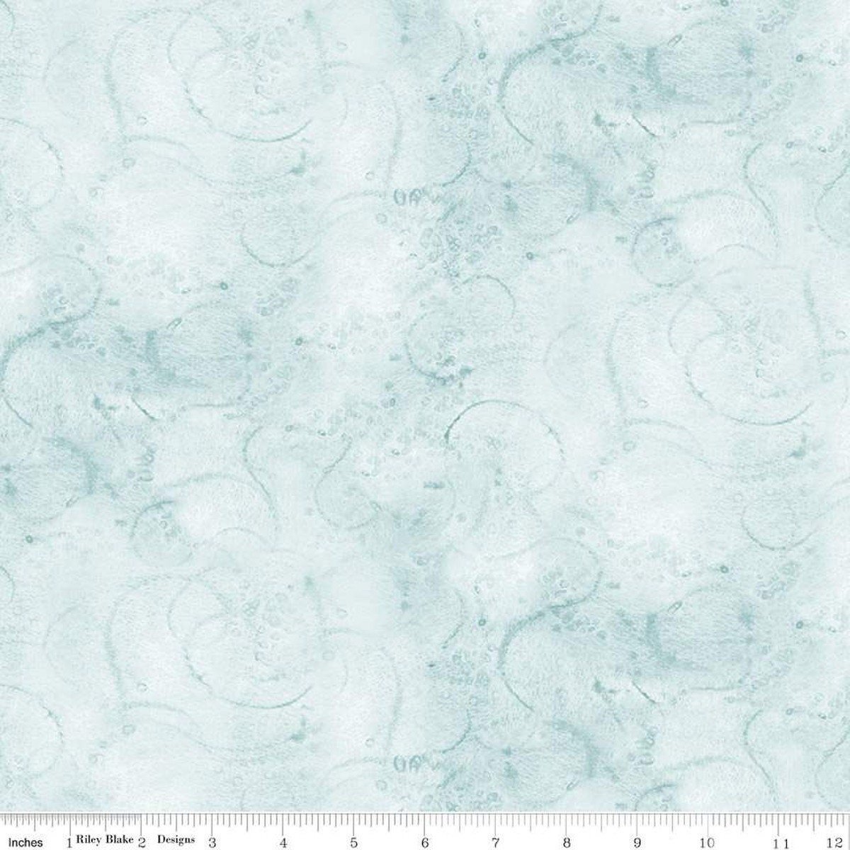 This Riley Blake fabric features a painter's watercolor brush marks in light denim blue swirls.