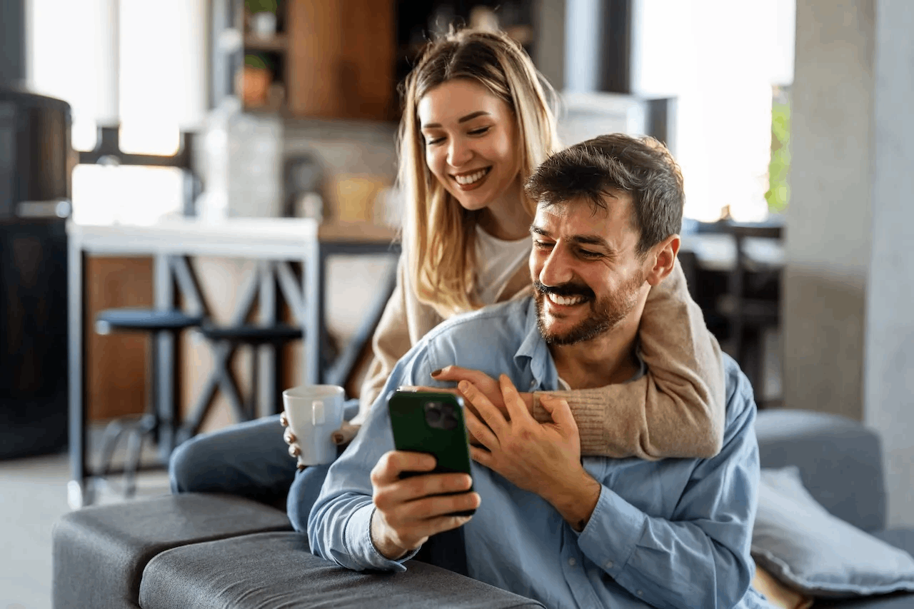 Couple participating in ongoing marriage counseling sessions focused on communication and skill building