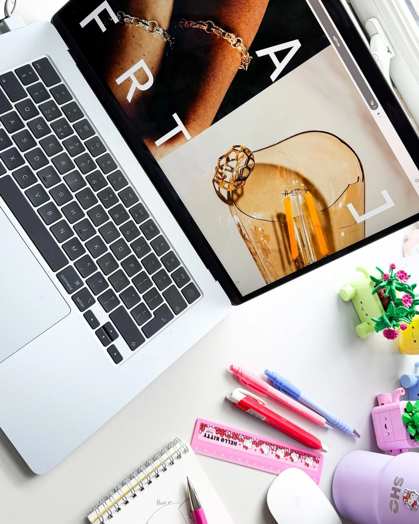 Want to know more about me? Have a look at my desk. 😅

On the screen: the ⁠@sajfrt_jewelry⁠ Squarespace website. It features a custom-coded landing page that loads a new image with each reload, and a mobile-responsive logo designed to stay perfectly