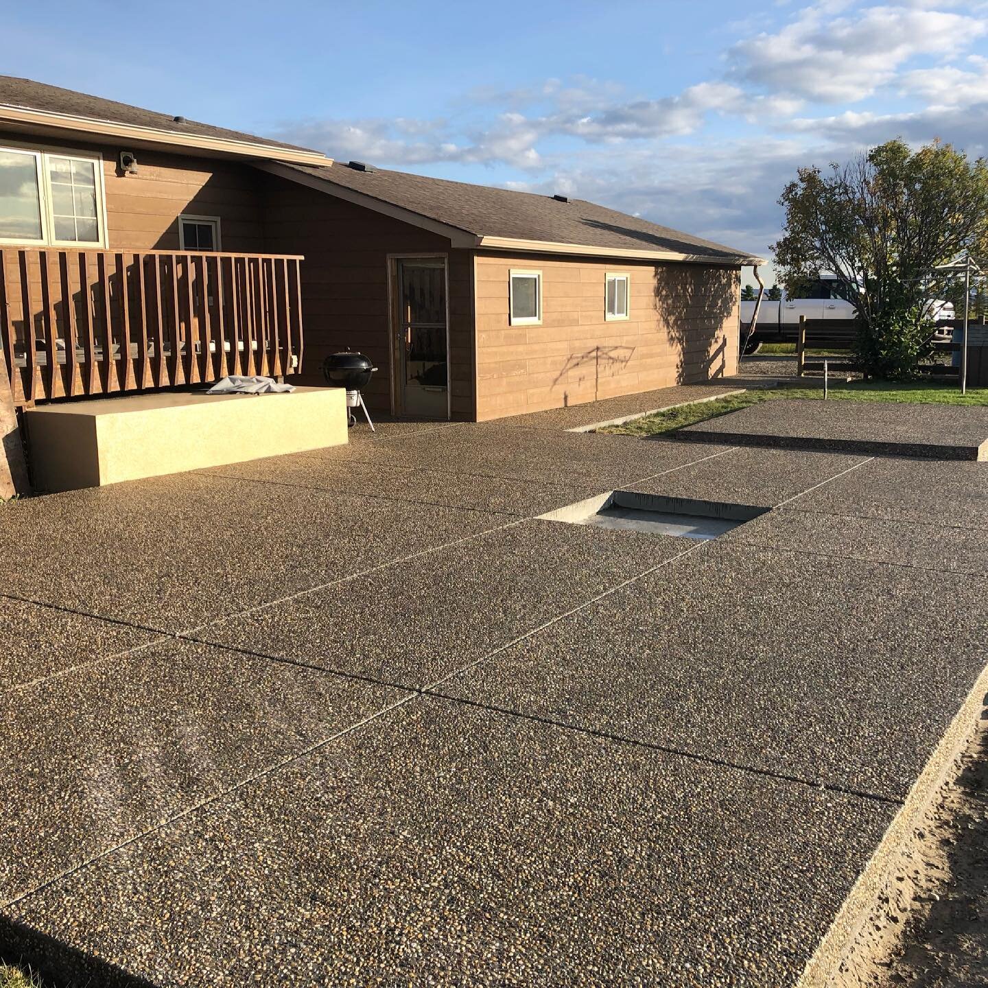 Edmonton Brown Stone - exposed aggregate patio. Love the colour in this mix. #oldschool #concrete #patio #lmcconcrete #yycconcrete #yycconstruction #calgaryconstruction #customconcrete