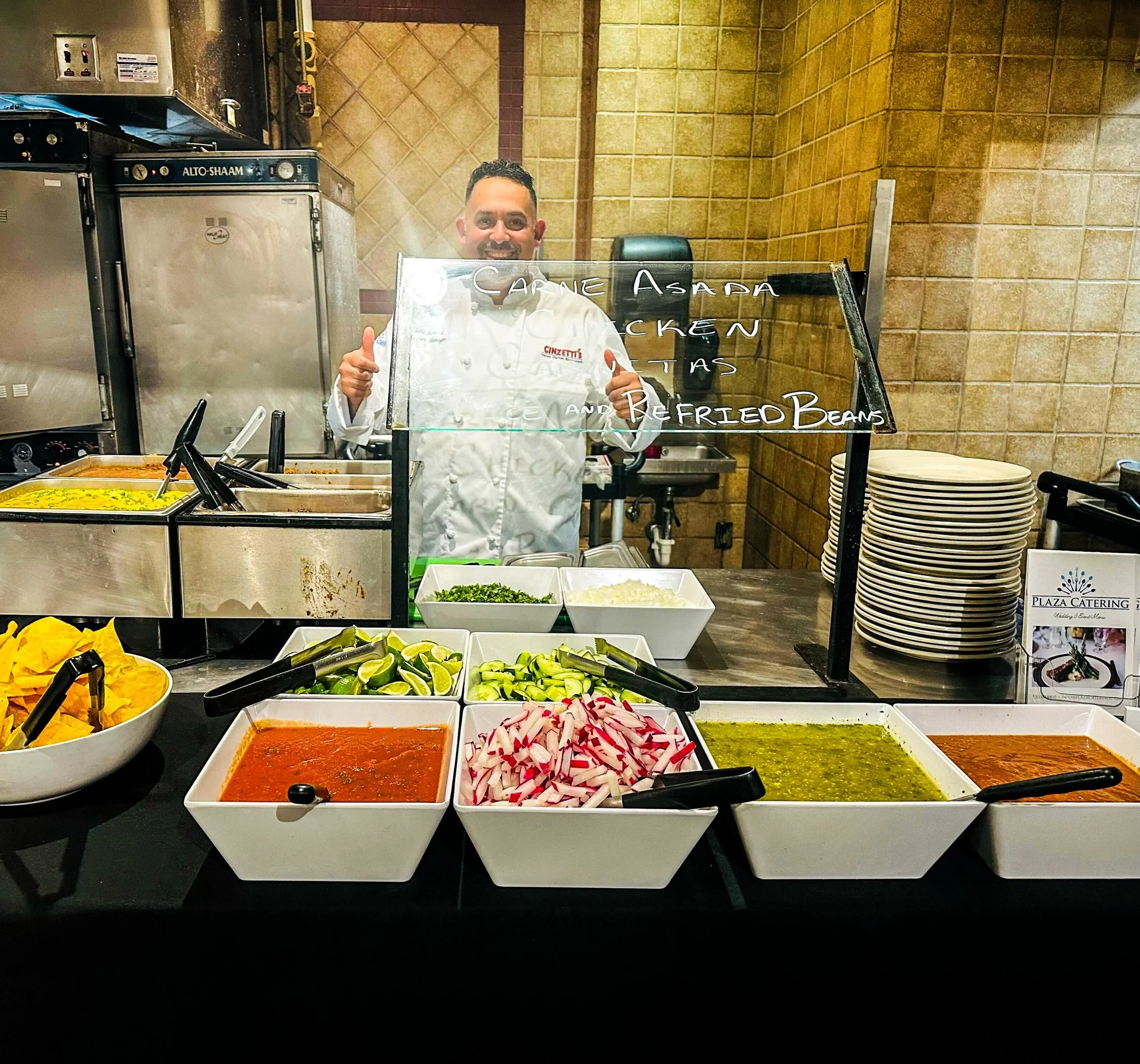 Plaza Catering delivers the fiesta! Our mobile taco bar brings authentic Mexican tacos to spice up any event. Complete with all the fixings - enjoy homemade salsas, corn &amp; flour tortillas, fresh toppings, Spanish rice, refried beans, chips, salsa