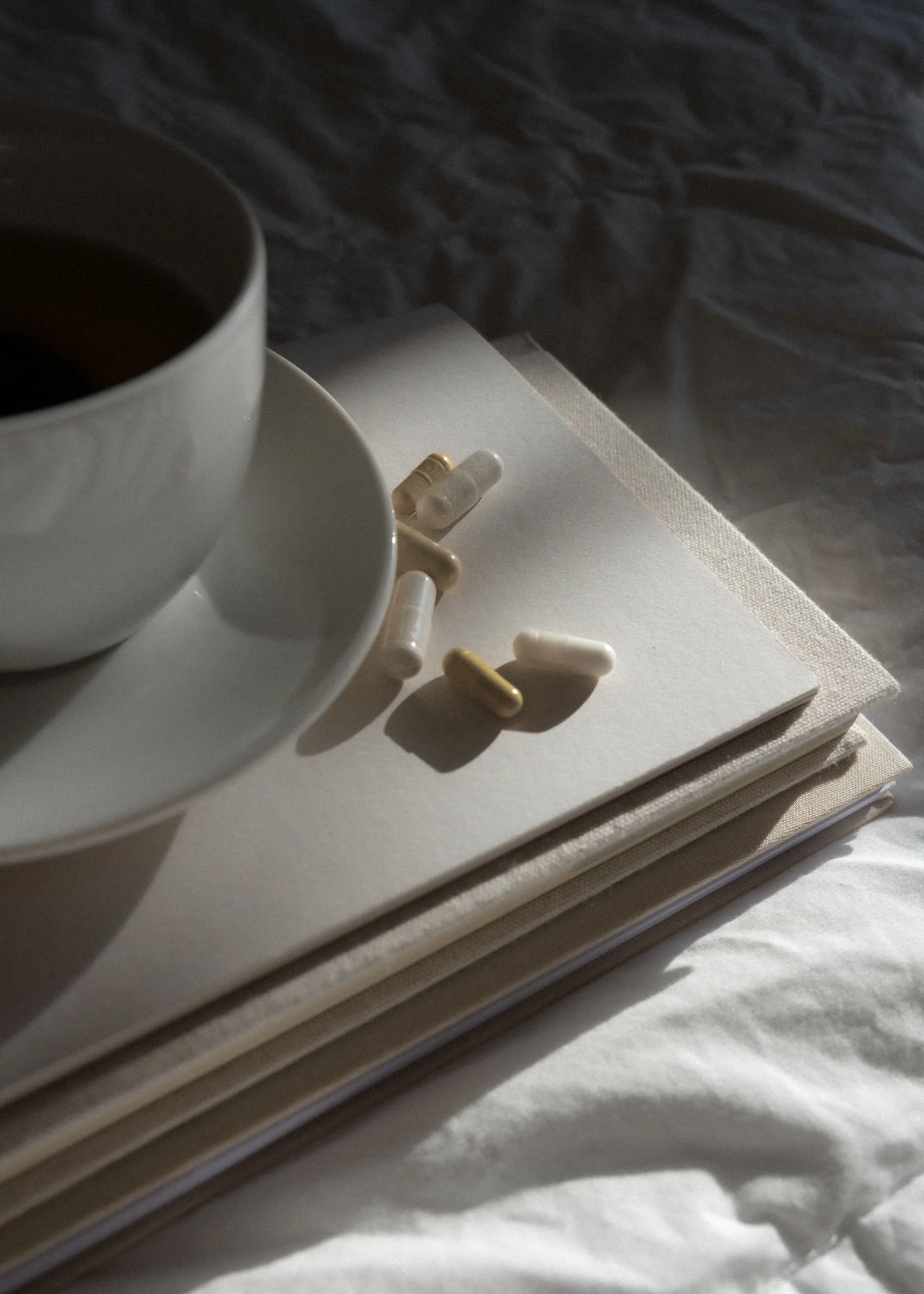 Medication on top of books