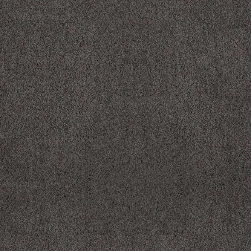 Close-up of a brown textured fabric surface.