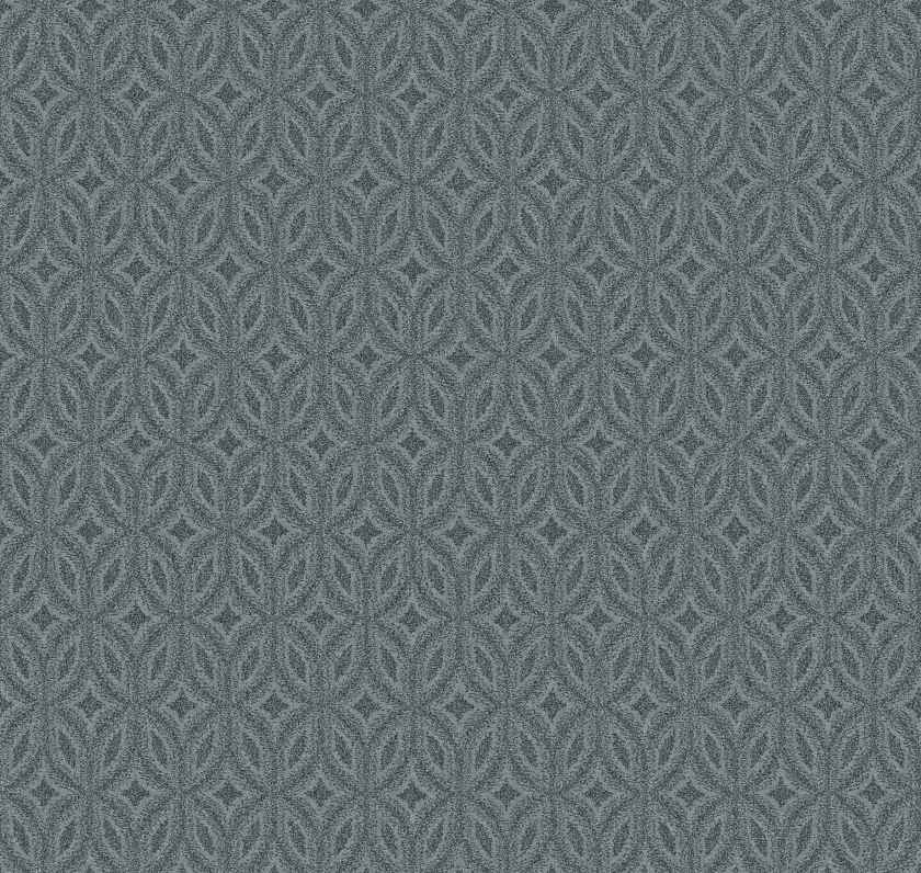 Close-up of a fabric or wallpaper with a repeating geometric pattern in gray and black colors.