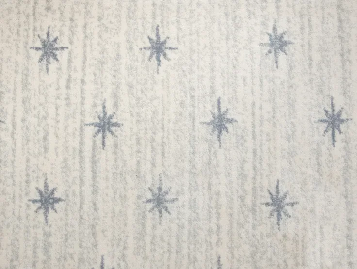 Pattern of blue snowflakes on a white textured background.