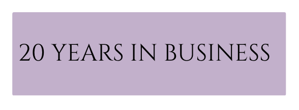 Purple rectangle banner with black text reading '20 Years in Business'.
