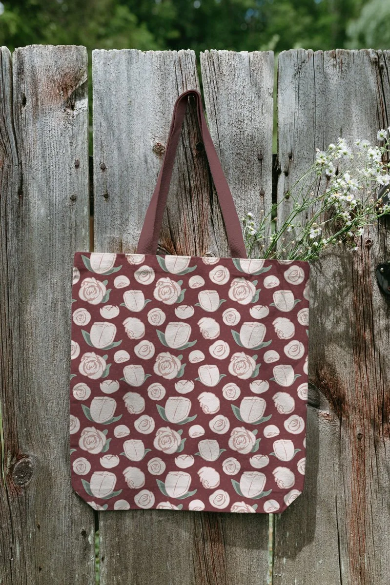 a tote bag featuring the rose fabric print