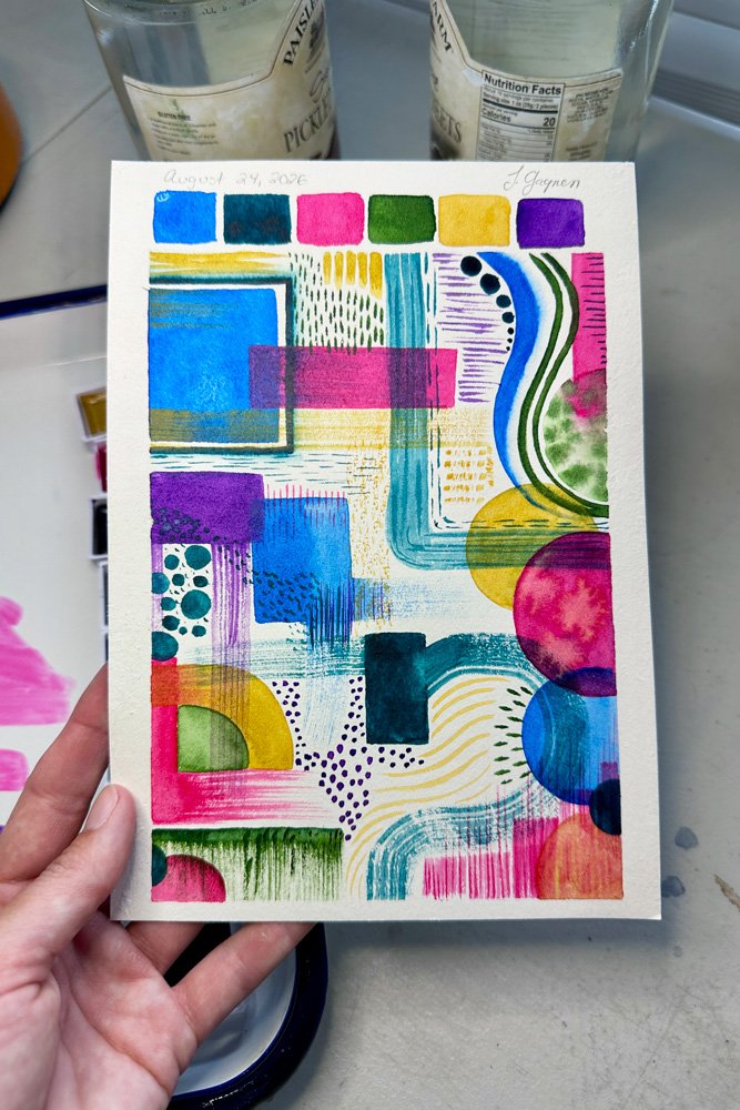 bright abstract painting featuring circles and lines